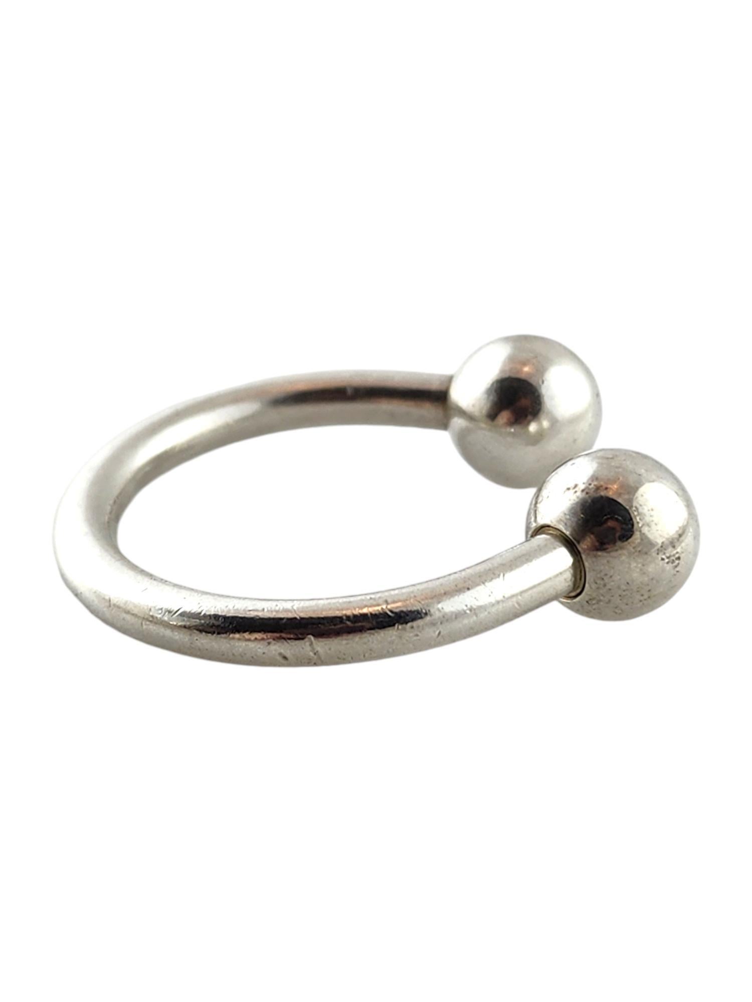 Tiffany & Co Sterling Silver Key Ring

This classic Tiffany & Co key ring was meticulously crafted from sterling silver for a gorgeous finish!

Size: 34.35mm X 32.12mm X 9.50mm

Weight: 15.58 g/ 10.02 dwt

Hallmark: 2001 Tiffany & Co 925

Very good