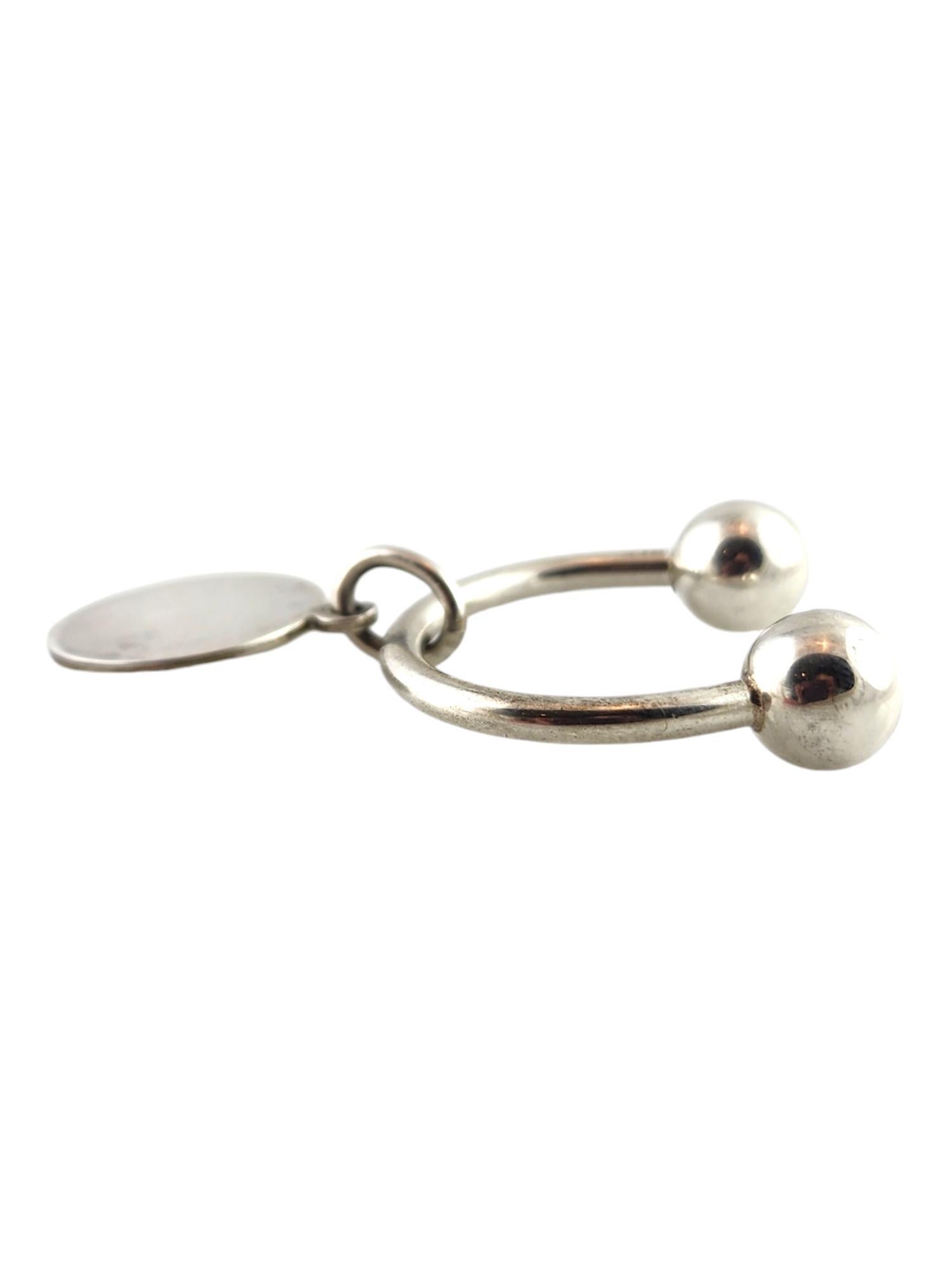 Tiffany & Co. Sterling Silver Key Ring with Circle Tag

This classic Tiffany & Co key ring was meticulously crafted from sterling silver with a circle Tiffany & Co circle tag!

Size: 29.85mm X 31.05mm X 9.35mm
Tag size: 23.15mm X 19mm X