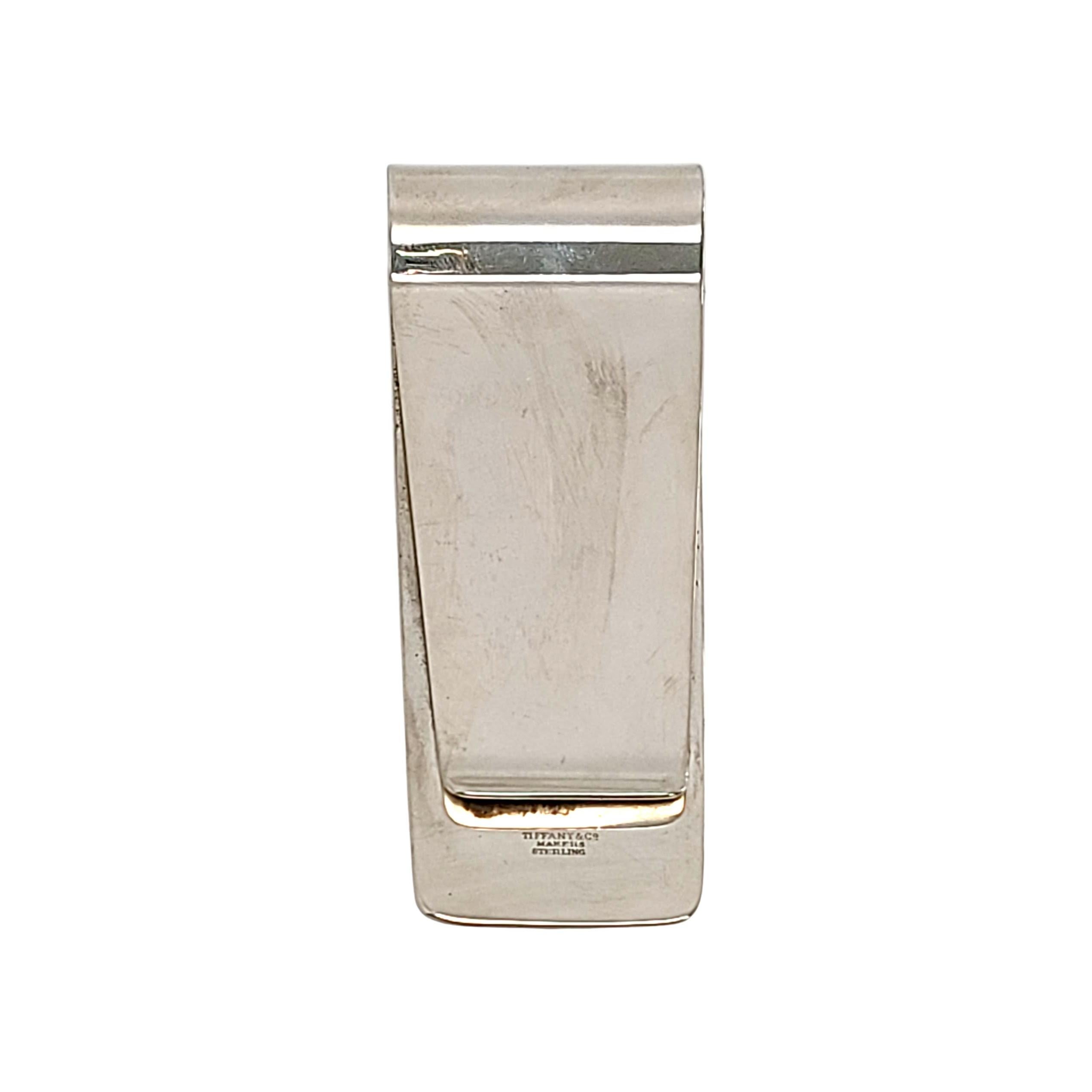 Sterling silver large money clip by Tiffany & Co.

Authentic Tiffany & Co money or card clip is large and substantially sized. It features a classic and timeless polished design. Tiffany box and pouch not included.

No monogram

Measures approx 4