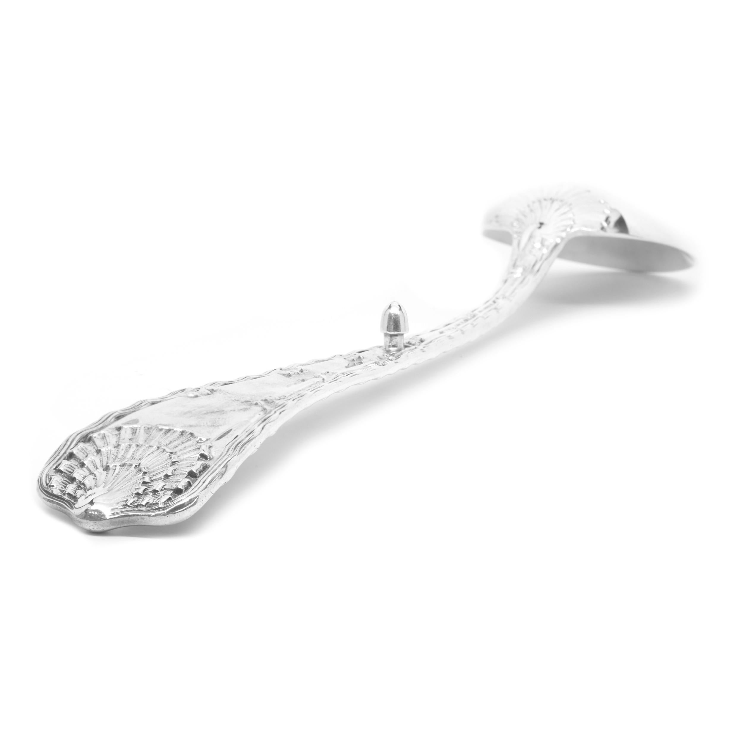 Designer: Tiffany & Co. 
Material: sterling silver
Dimensions: ladle measures 12.5” X 2.25”
Weight: 90 grams
