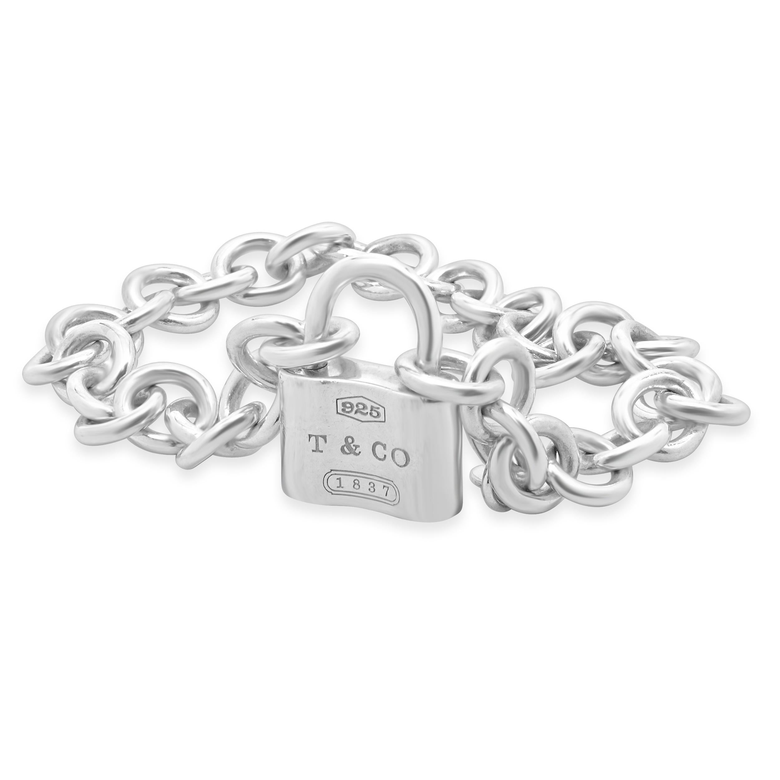 Designer: Tiffany & co. 
Material: sterling silver
Dimensions: bracelet will fit approximately a 6.75-inch wrist 
Weight: 23.22 grams
