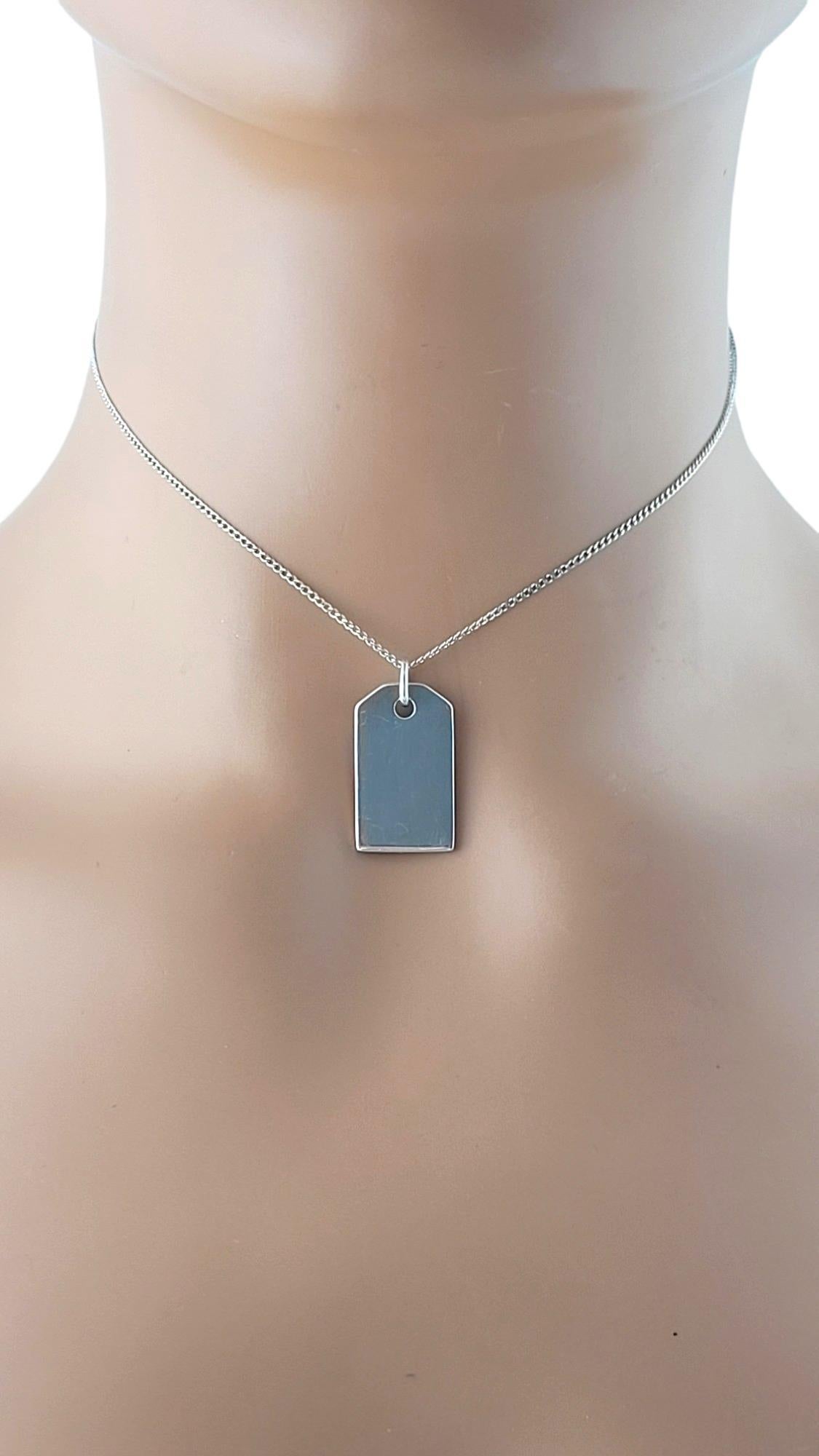 designer luggage tag charm