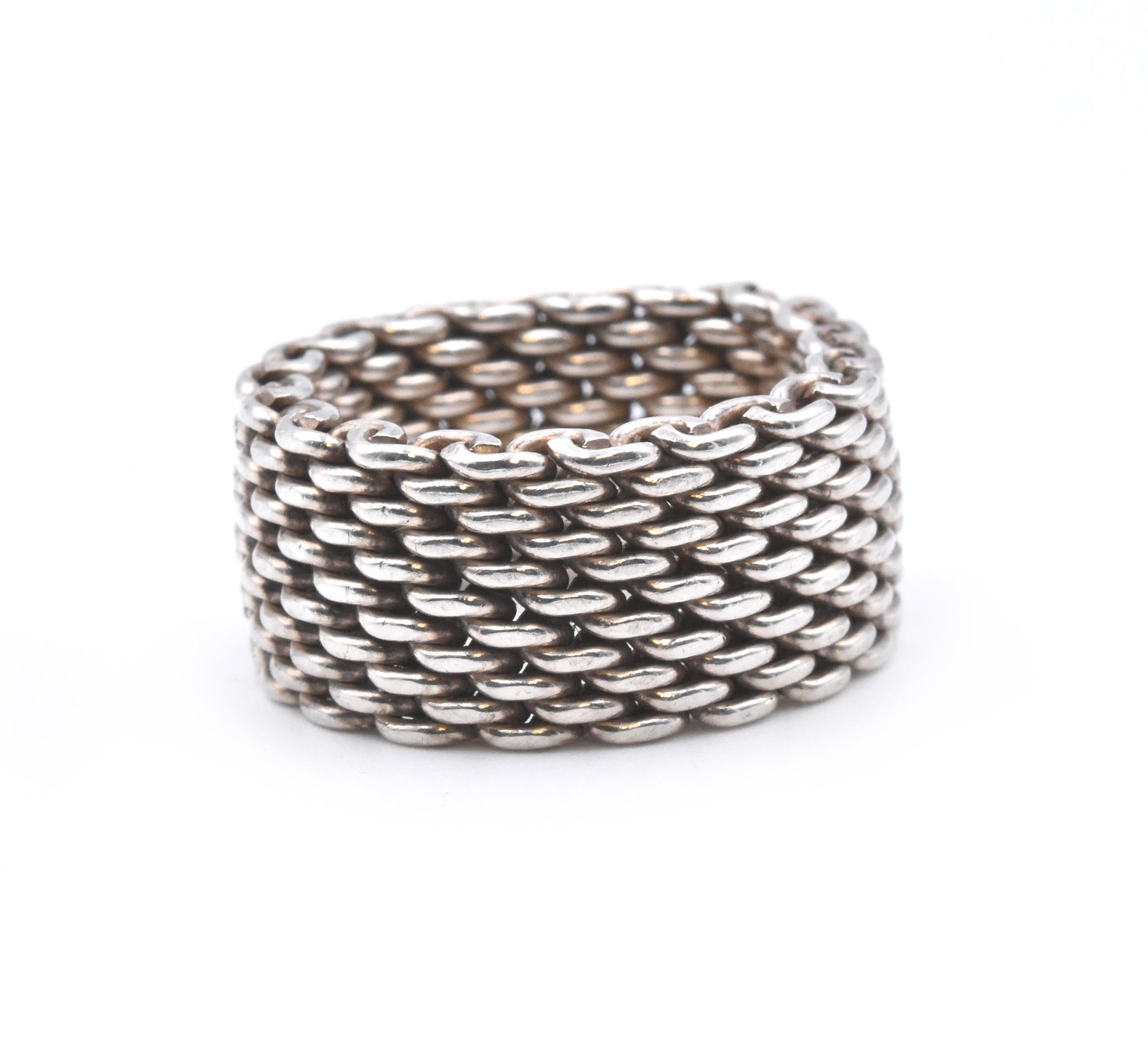 Designer: Tiffany & Co. 
Material: sterling silver
Dimensions: band measures 10mm wide
Size: 6
Weight: 8.17 grams