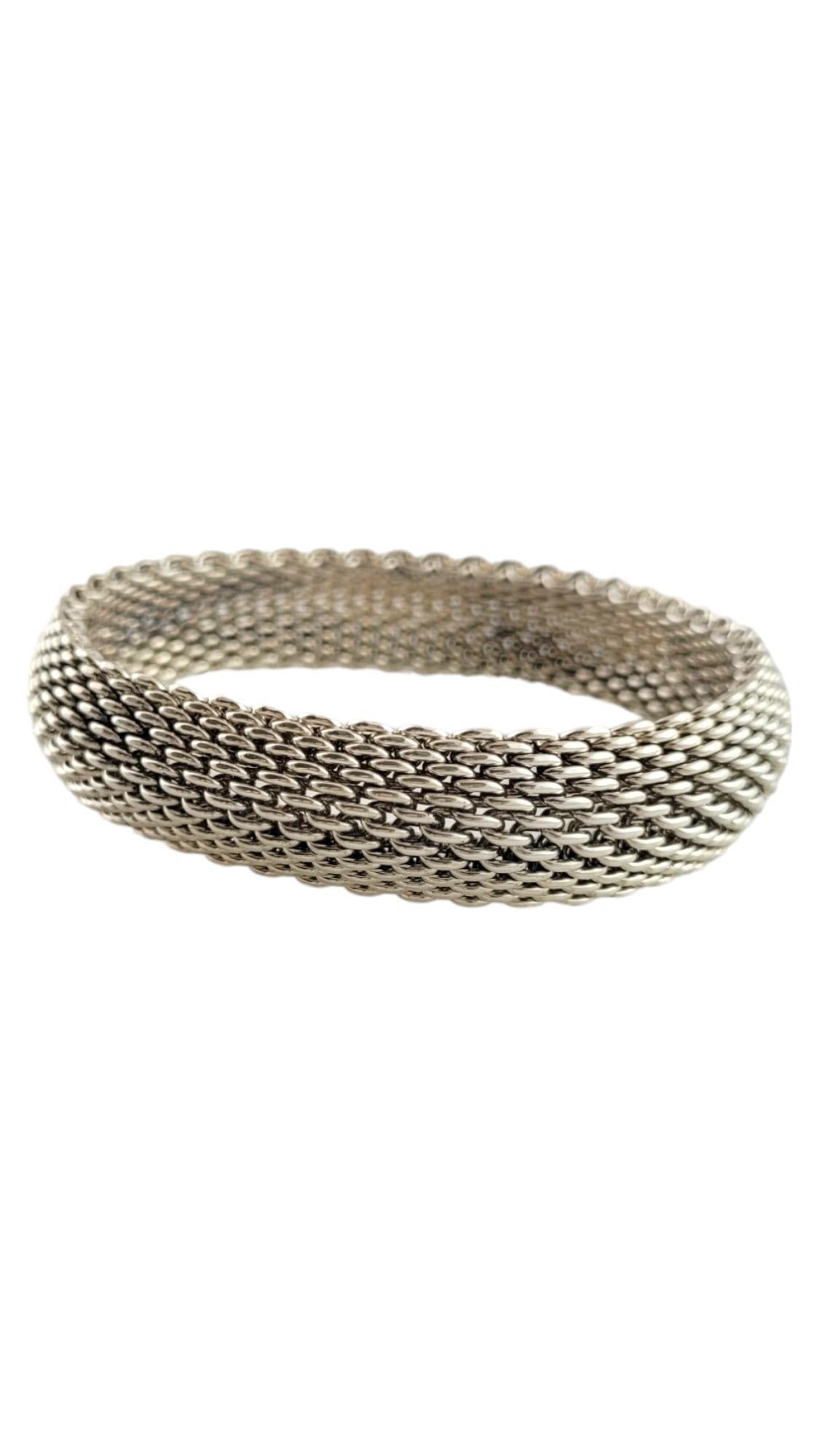 Tiffany & Co Sterling Silver Mesh Bangle Bracelet

This gorgeous Tiffany & Co. bracelet was crafted from sterling silver in a beautiful mesh pattern!

Size: 7 3/4
