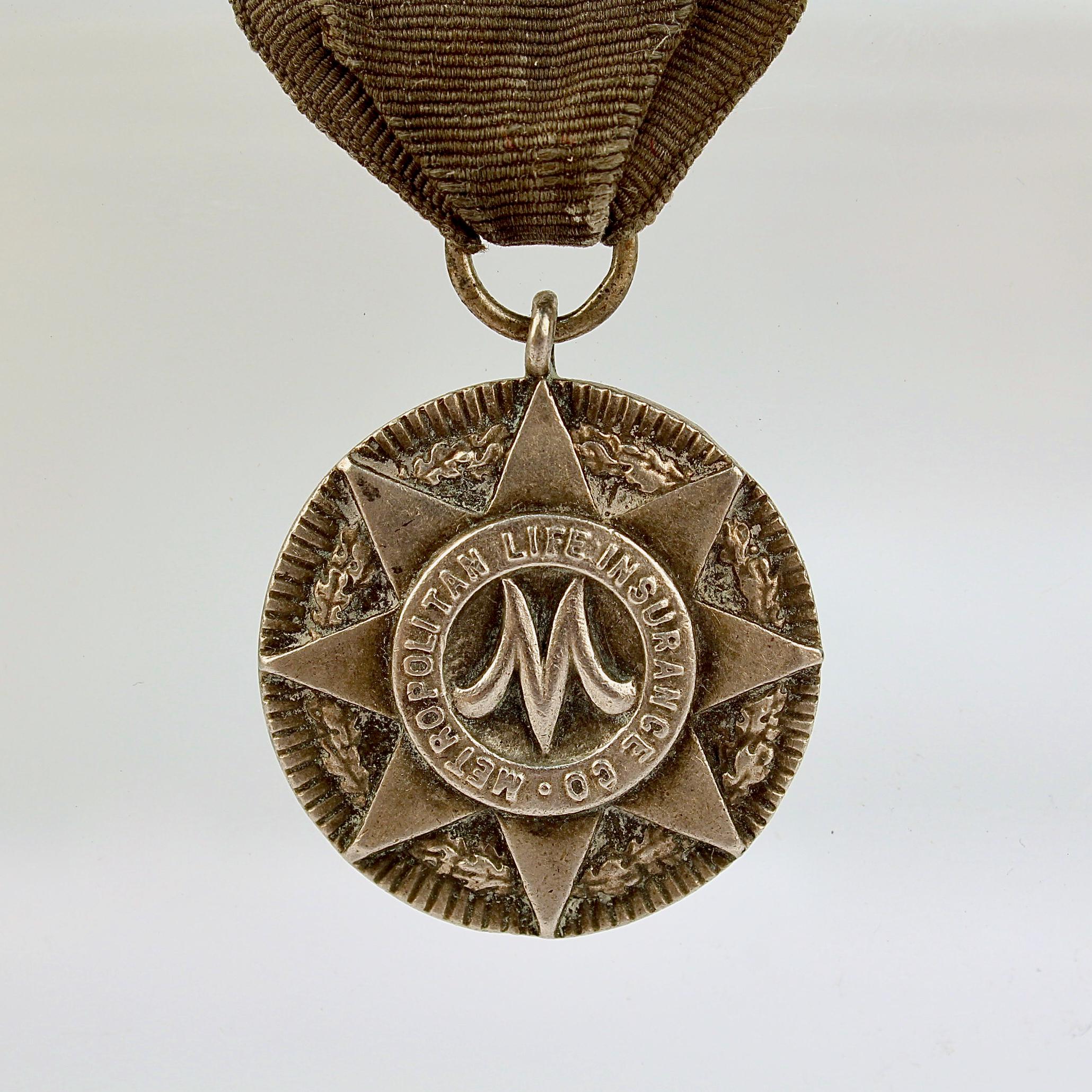 Tiffany & Co. Sterlingsilber-Medaille des Metropolitan Life Versicherungsservice (Moderne) im Angebot