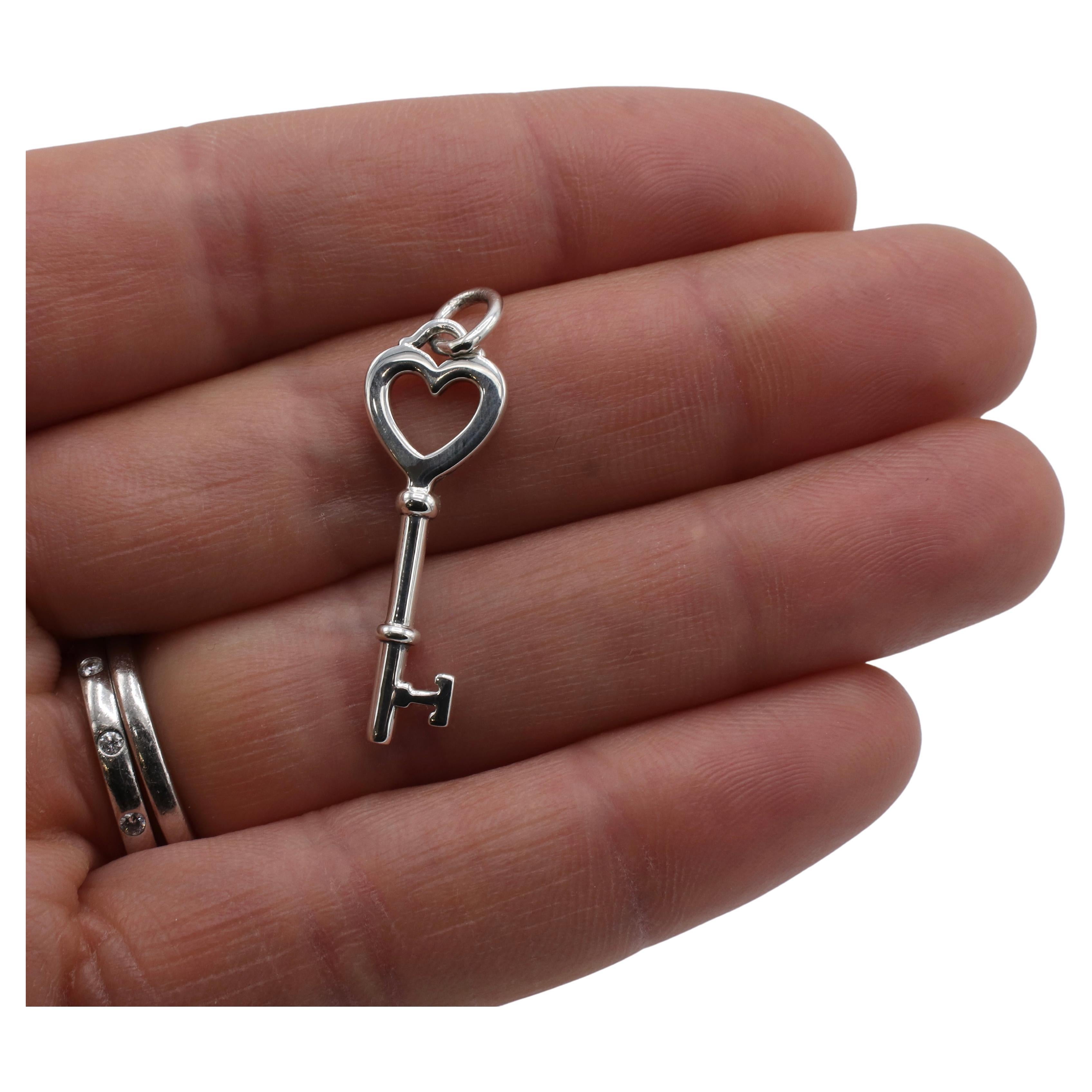 Modern Tiffany & Co. Sterling Silver Mini Heart Key Pendant 