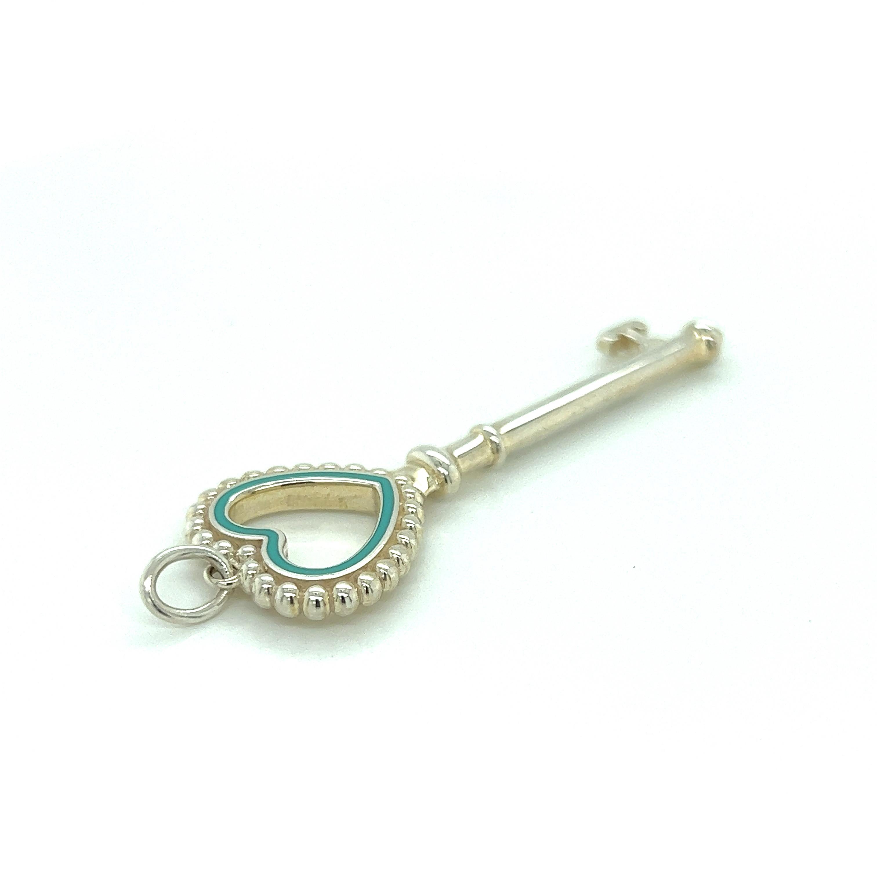 Modern Tiffany & Co. Sterling Silver Mint Green Enamel Bead Heart Key Charm Pendant For Sale