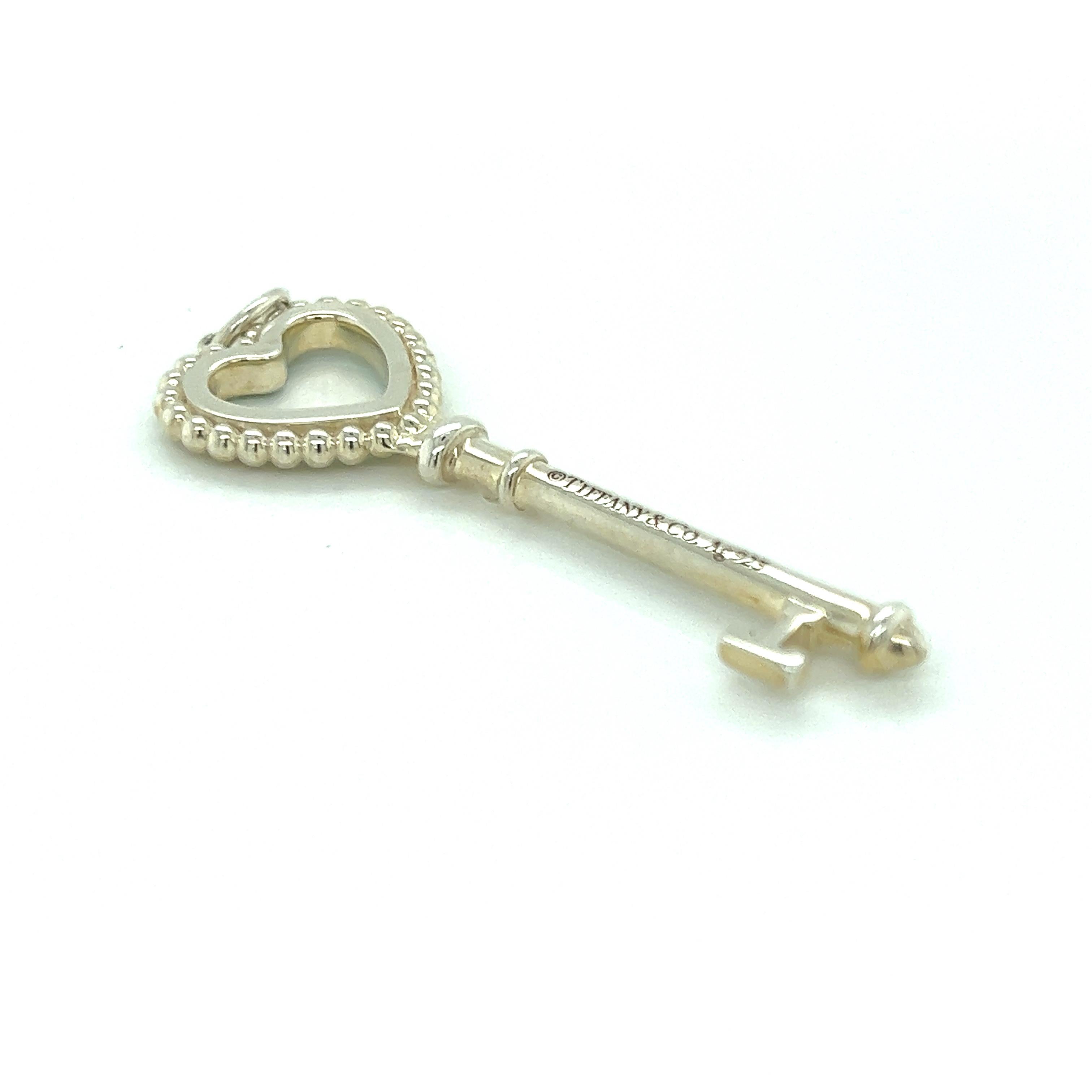 Tiffany & Co. Sterling Silver Mint Green Enamel Bead Heart Key Charm Pendant In Excellent Condition For Sale In Boca Raton, FL