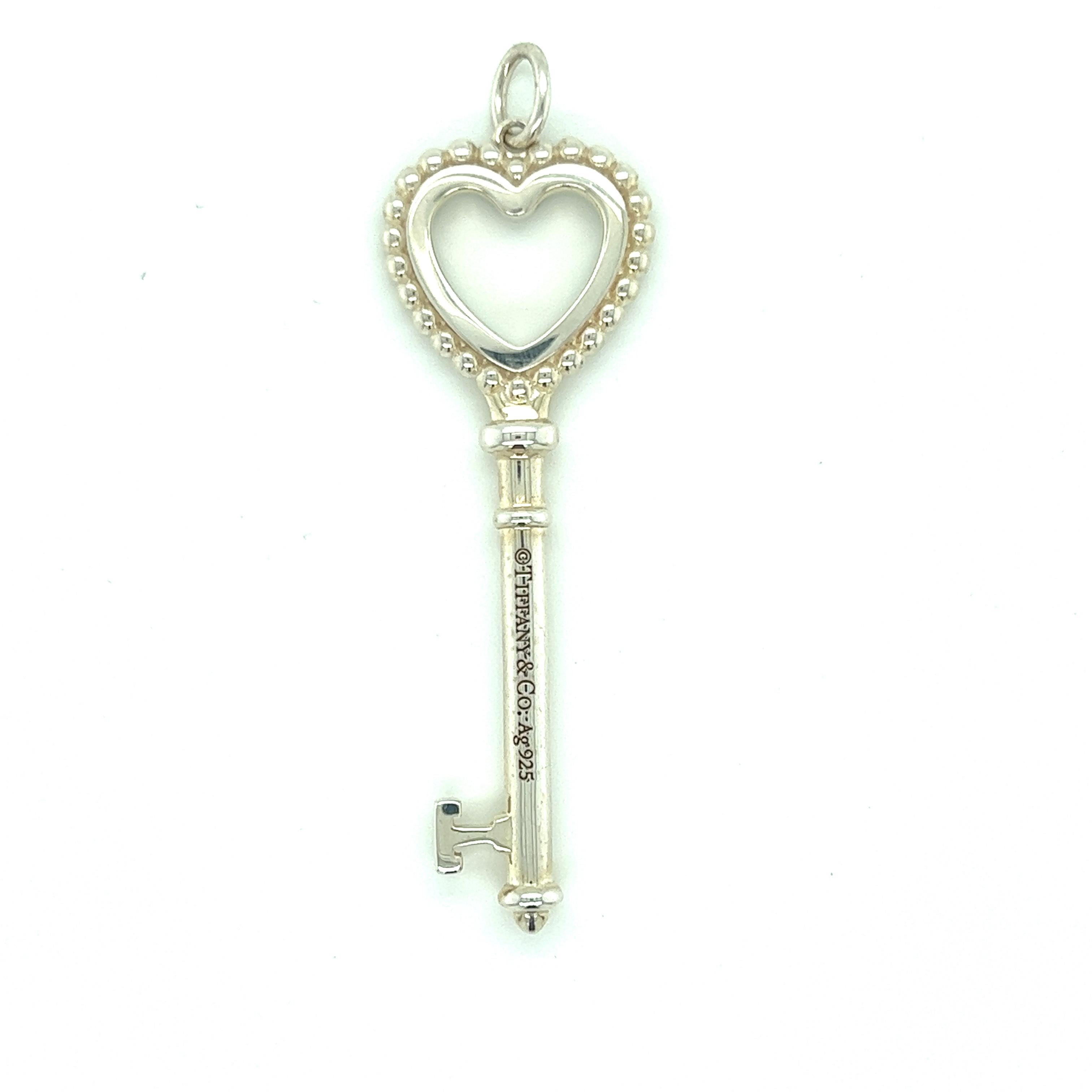 Women's Tiffany & Co. Sterling Silver Mint Green Enamel Bead Heart Key Charm Pendant For Sale