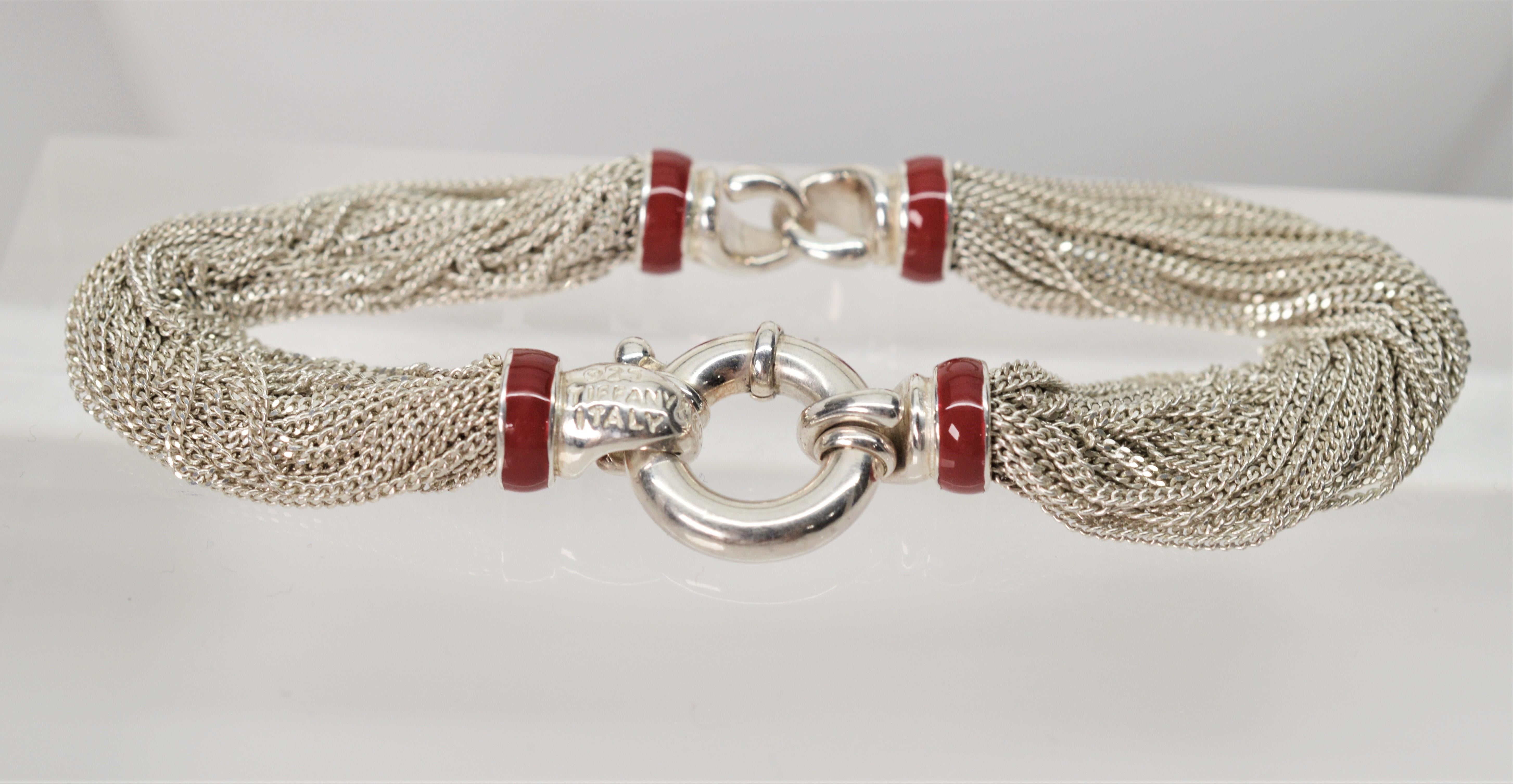 Attention-getting and hard to find, this Tiffany & Co. Sterling Silver Multi Chain Three Station Necklace with red enamel accents including the matching Tiffany Bracelet is sure to please. Made with multiple strands of Tiffany .925 Sterling Silver,