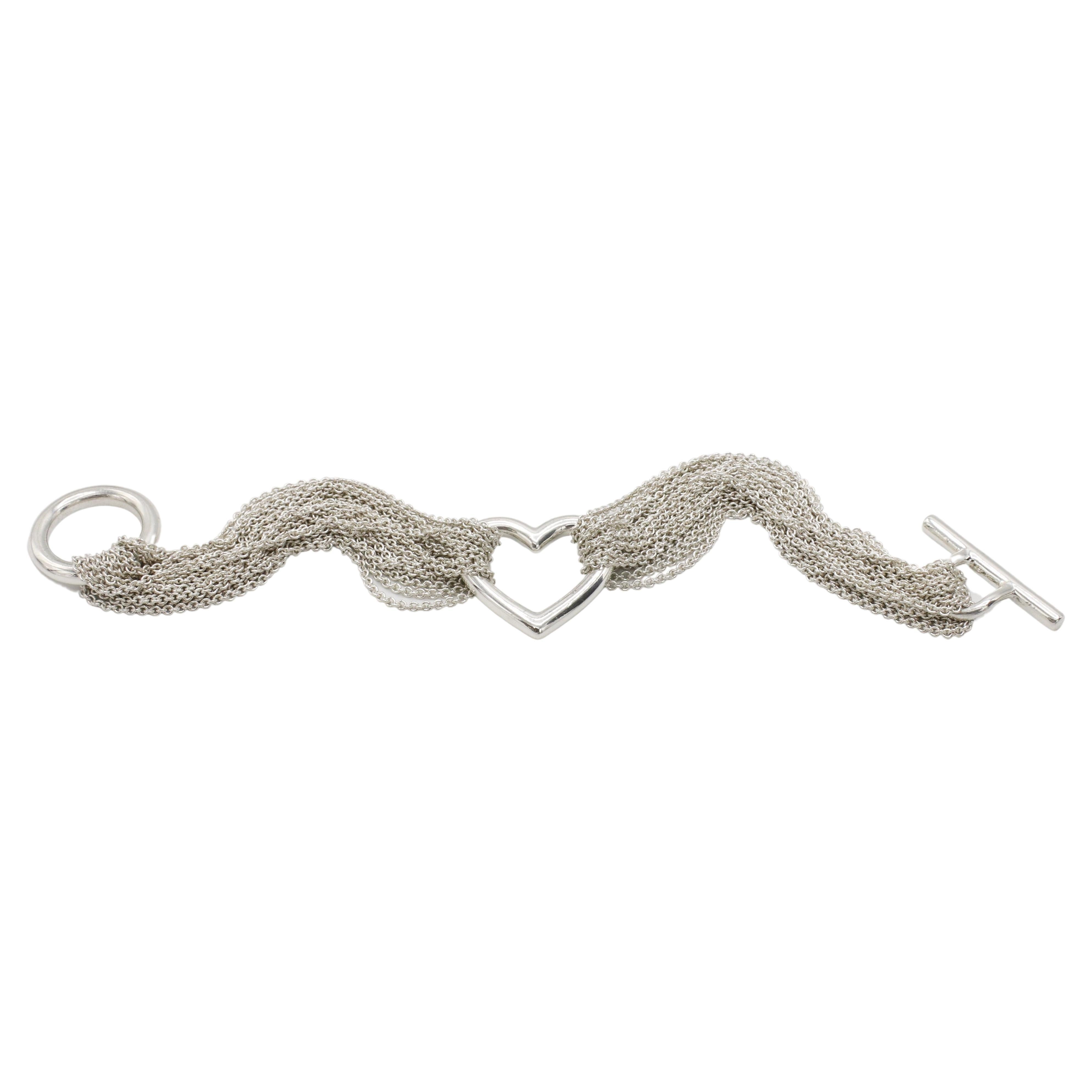 Tiffany & Co. Bracciale a cuore aperto a più file in argento sterling 
Metallo: Argento sterling
Lunghezza: 7 pollici
Cuore: 24 x 24,5 mm
Peso: 33.4 grammi
Firmato: ©Tiffany & Co. 925 