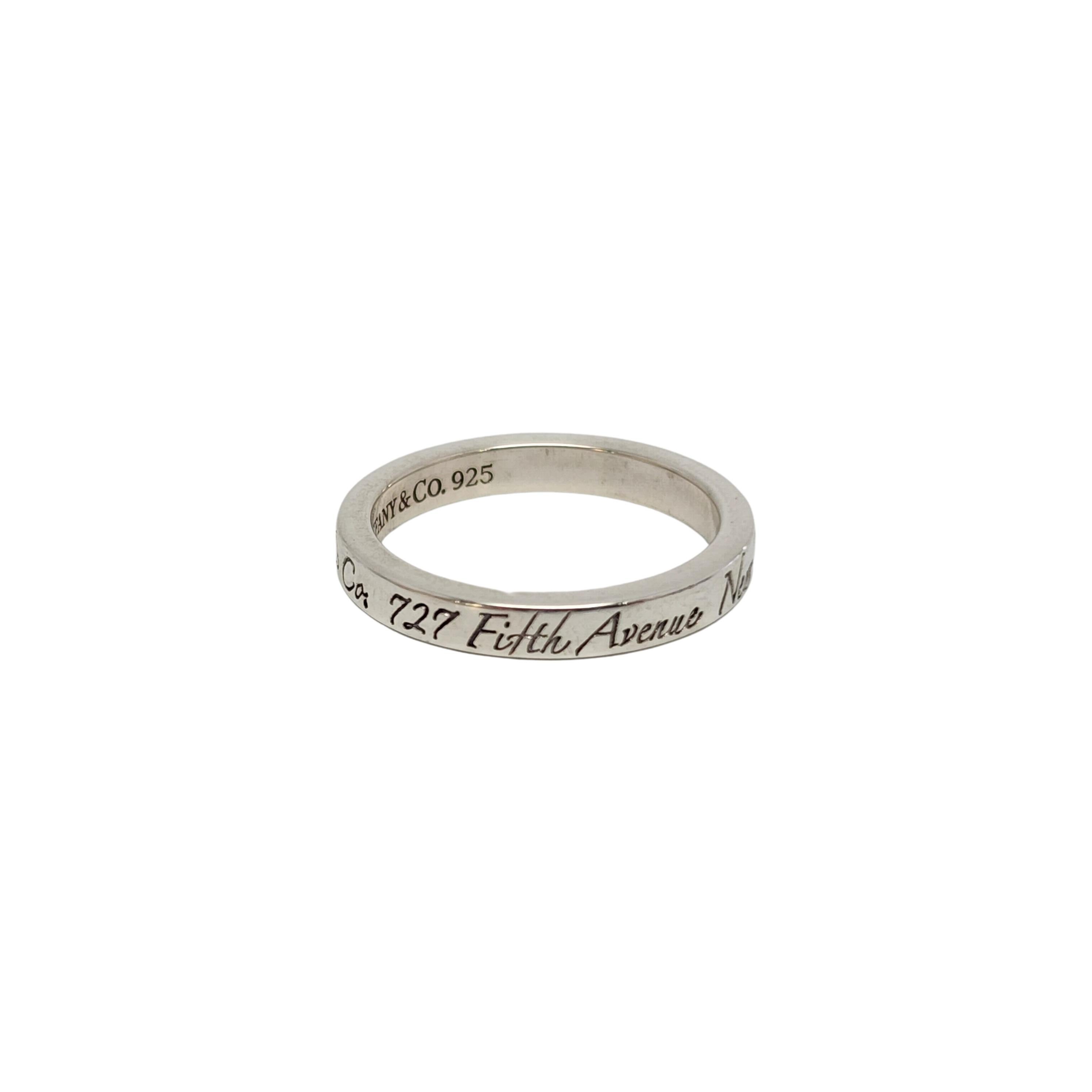 Tiffany & Co sterling silver NY Address Notes narrow band ring.

Size 5 1/4

Authentic Tiffany ring inscribed with Tiffany's NYC 5th Ave address. Tiffany pouch and box not included.

Band measures approx 2.8mm wide.

Weighs approx 2.6g, 1.7dwt

Very