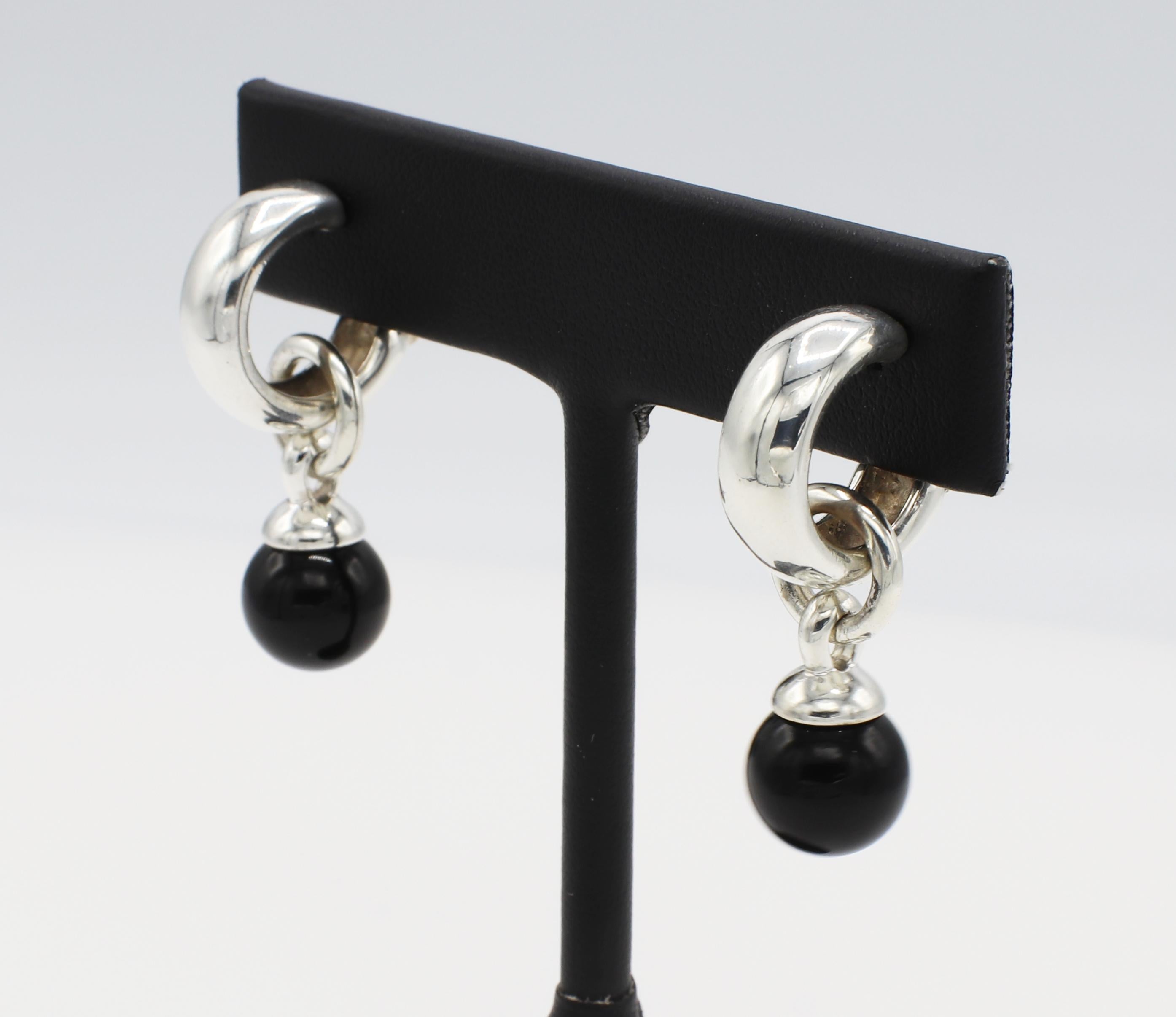 Tiffany & Co. Sterling Silver Onyx Ball Hoop Drop Earrings 
Metal: Sterling silver
Weight: 13.79 grams
Onyx: 10.1MM
Length: 33.5MM
Width: 17MM
Signed: 1995 Tiffany & Co. 925