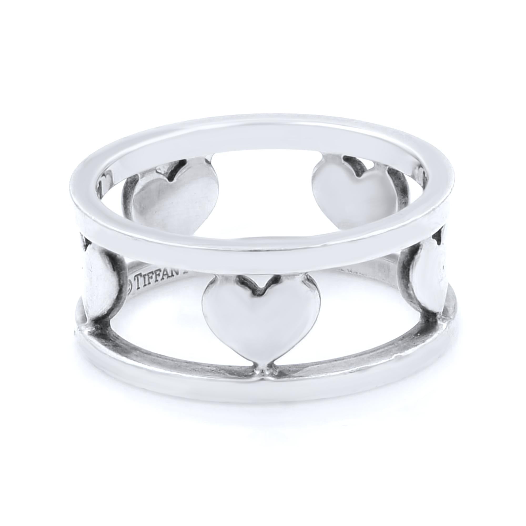An Authentic Tiffany & Co Sterling Silver Open Heart Eternity Ring.
Size: 7
Width: 8.6mm
Pouch: Yes
Will polish before shipping.
Pre-owned good condition.