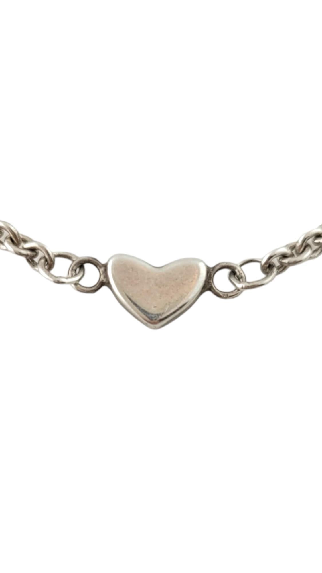 Tiffany & Co. Sterling Silver Open Heart Lariat Necklace

This gorgeous open-heart necklace by designer Tiffany & Co is crafted from 925 sterling silver for a beautiful finish!

Length: 16.75
