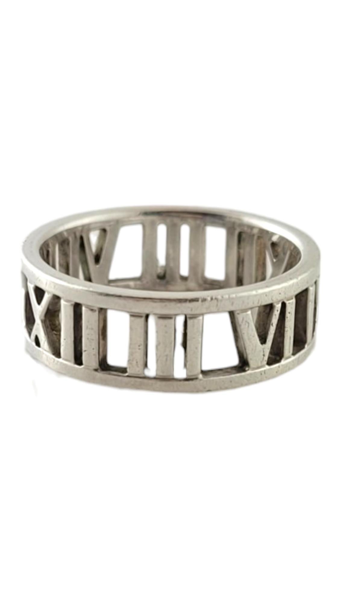 Tiffany & Co. Sterling Silver Open Roman Numeral Band Ring Size 7.25-7.5

This gorgeous open roman numeral band ring by Tiffany & Co. was crafted from sterling silver!

Size: 7.25-7.5
Shank: 6.70mm 

Weight: 2.40 dwt/ 3.73 g

Hallmark: T&Co