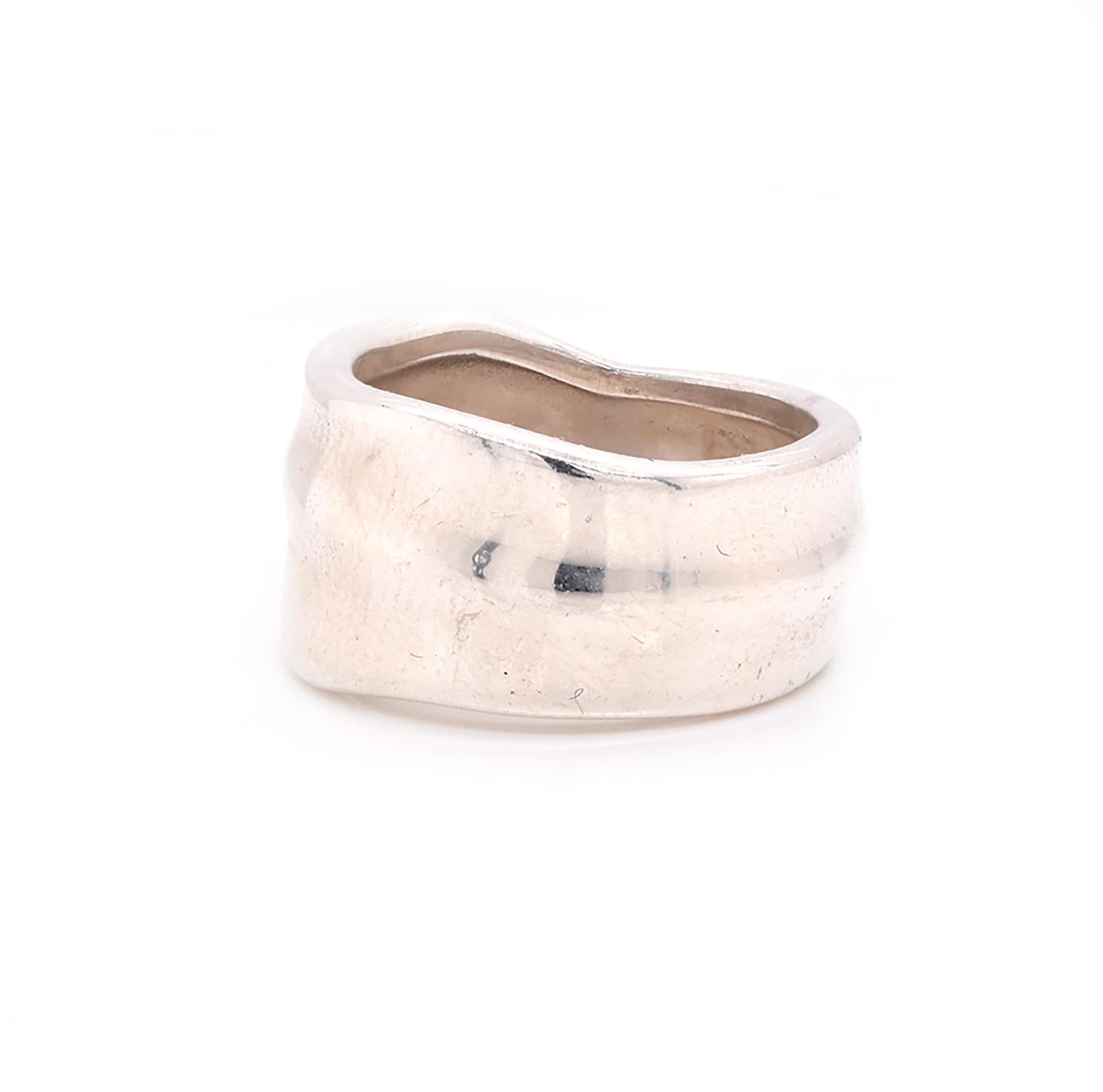 Designer: Tiffany & Co.
Material: Sterling silver 
Measurement: Band measures 10.7mm wide
Size: 4.5 (please allow two additional days for complimentary sizing) 
Weight: 6.84 grams