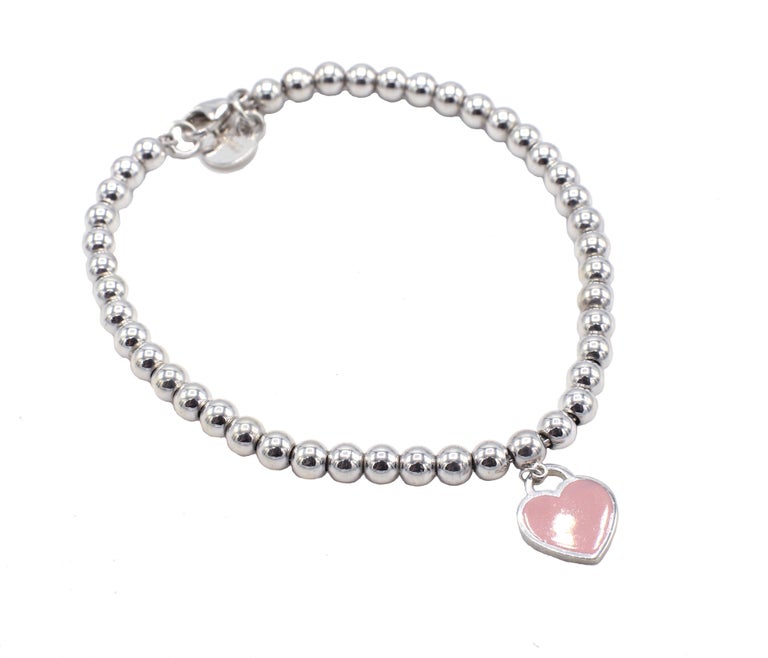 Tiffany and Co. Sterling Silver Pink Heart Return to Tiffany Tag Bead  Bracelet at 1stDibs | heart tag bead bracelet, tiffany pink heart bracelet,  tiffany and co pink heart bracelet