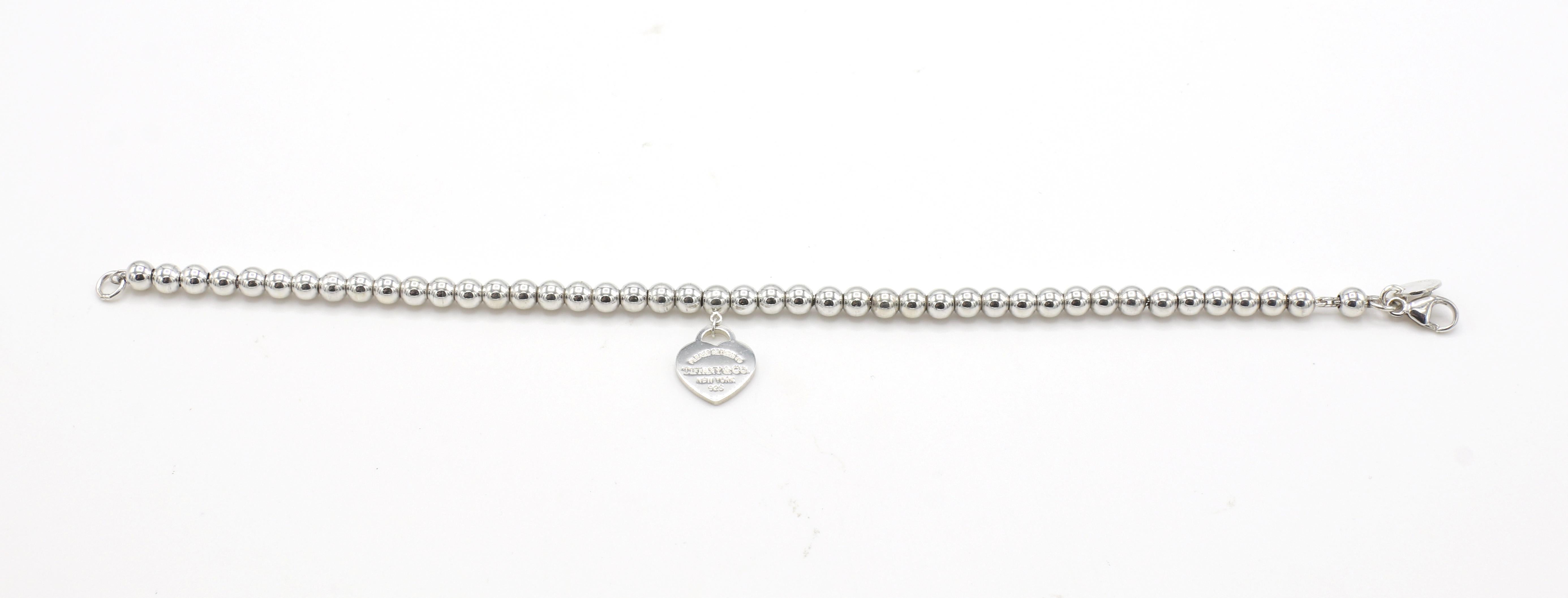 pink heart tag bead bracelet