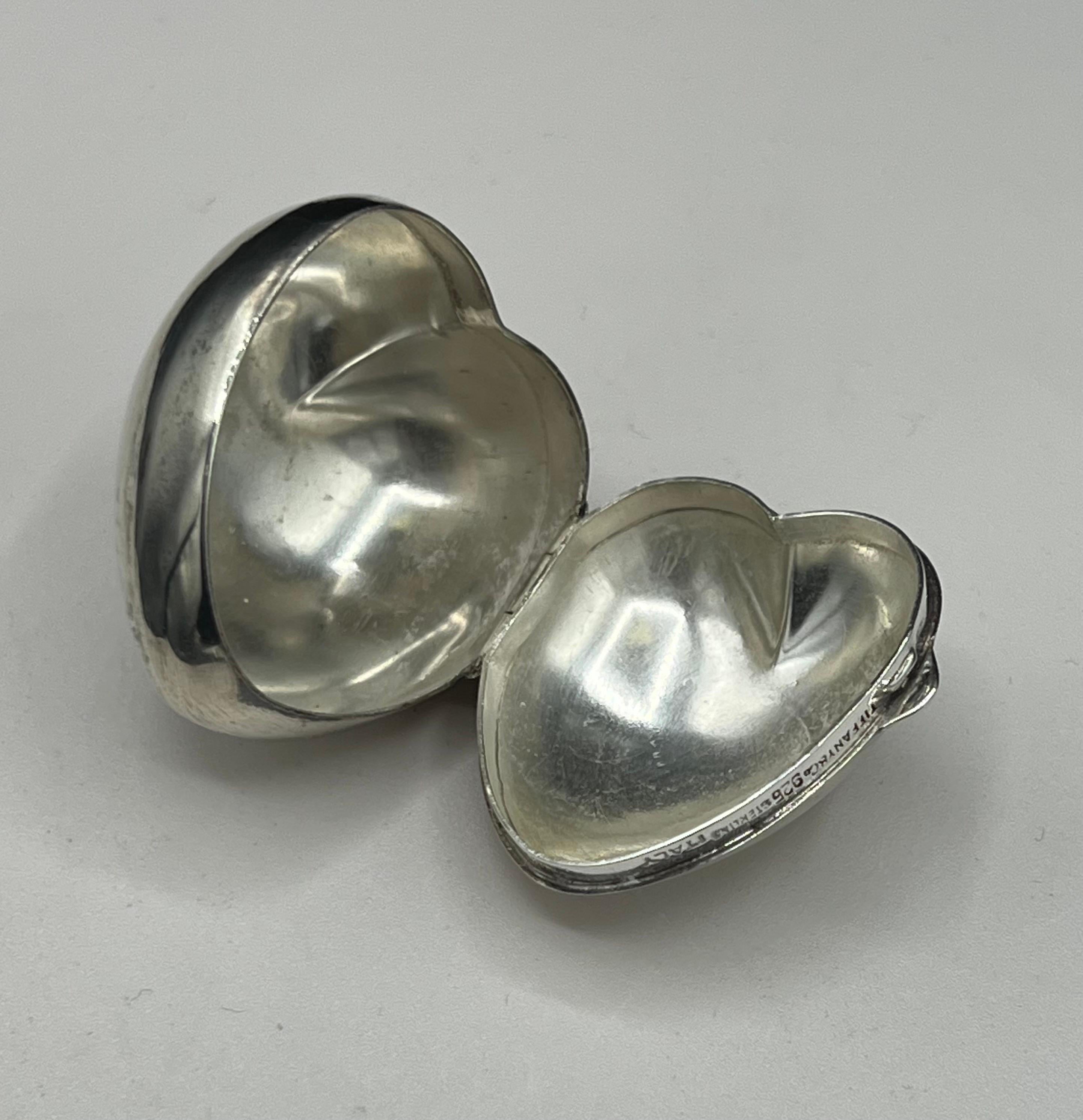 This elegant “ Puffed Heart “ Pill Box by Tiffany & Co.   The legendary Tiffany brand was founded in 1837 by Charles Lewis Tiffany and John B. Young in Connecticut as a 