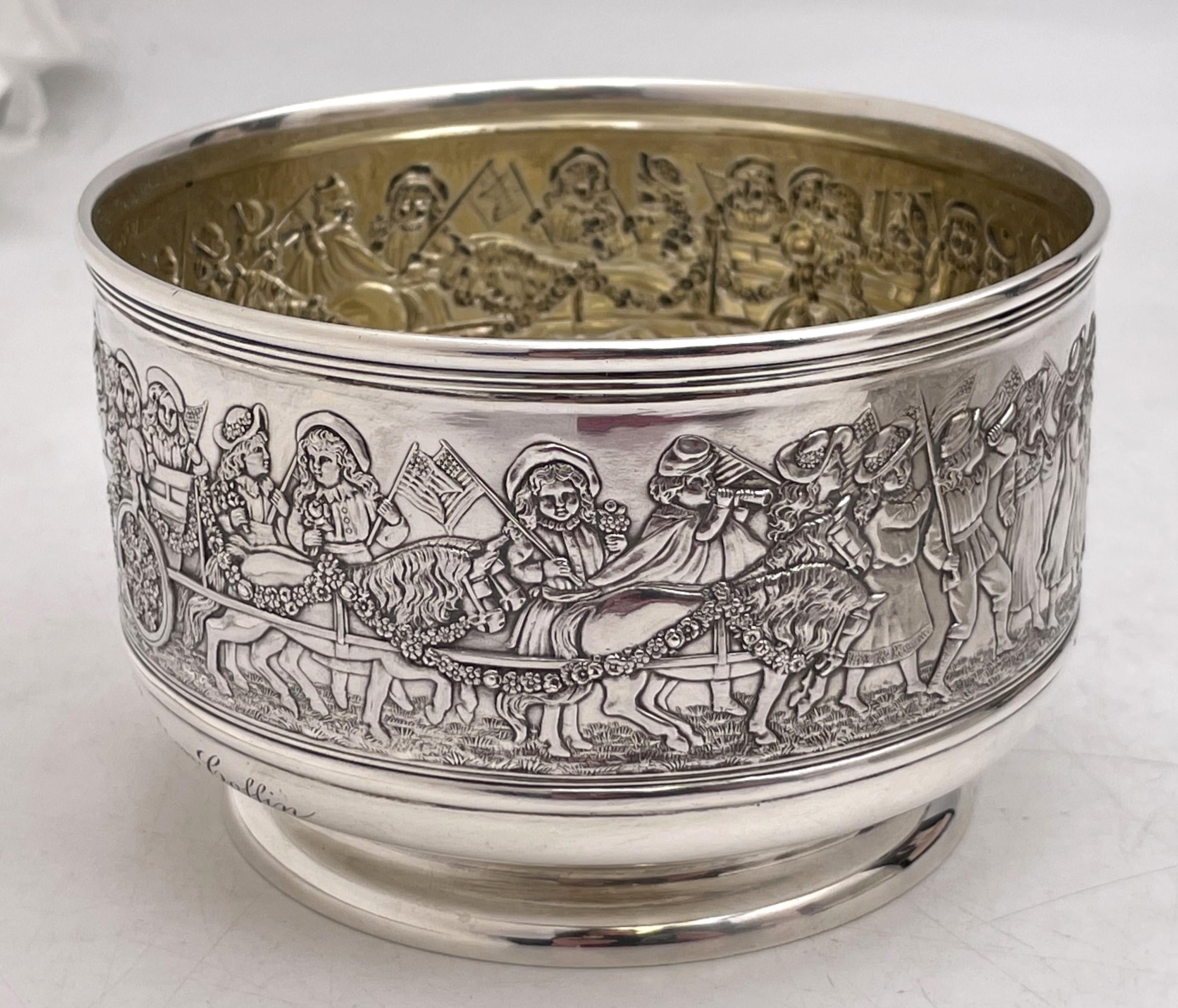 Tiffany & Co. sterling silver rare child bowl and porringer, depicting a patriotic children's marching band, beautifully embossed. The bowl dates from 1892 to 1902, measures 5 '' in diameter by 3 1/8'' in height, and contains one and a half pints.