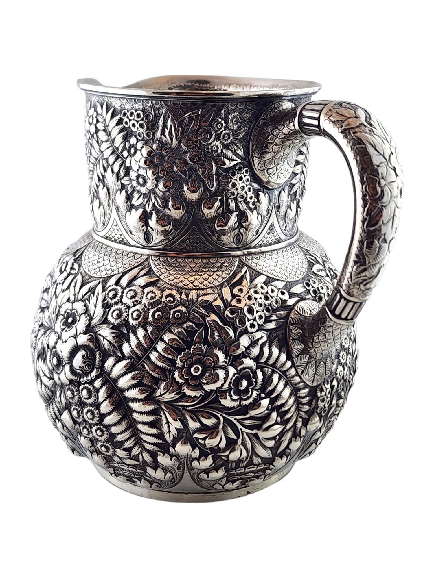 Tiffany & Co. Sterling Silver Repousse 1901 5.5 pts Water Pitcher

This gorgeous water pitcher by designer Tiffany & Co in the Repousse pattern was meticulously crafted from sterling silver with beautiful detailing and carries 5 1/2 pts of water!

7