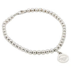 Tiffany & Co. Sterling Silver Return to Tiffany 4MM Bead Tag Charm Bracelet