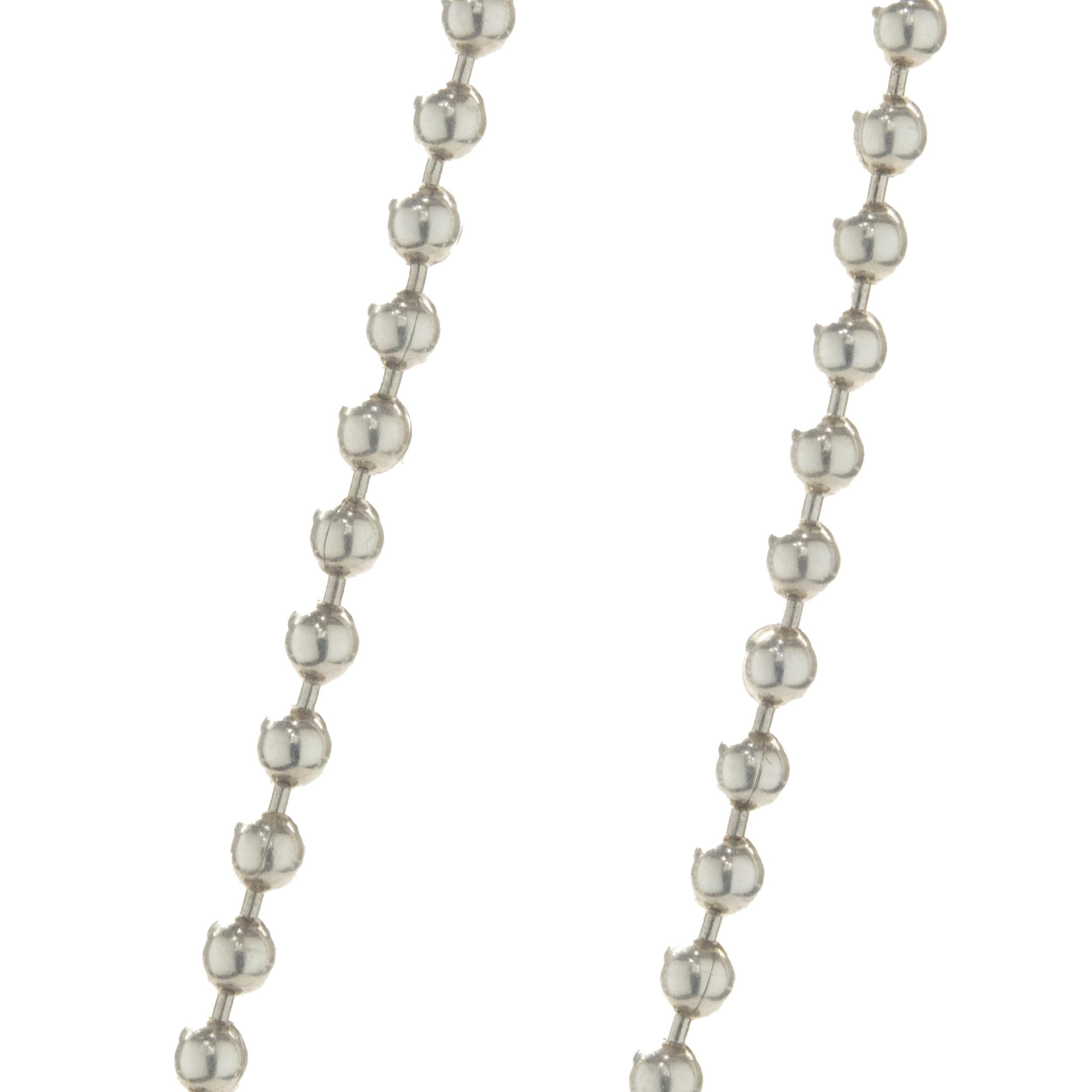 Designer: Tiffany & Co. 
Material: sterling silver
Dimensions: necklace measures 32-inches
Weight: 28.41 grams