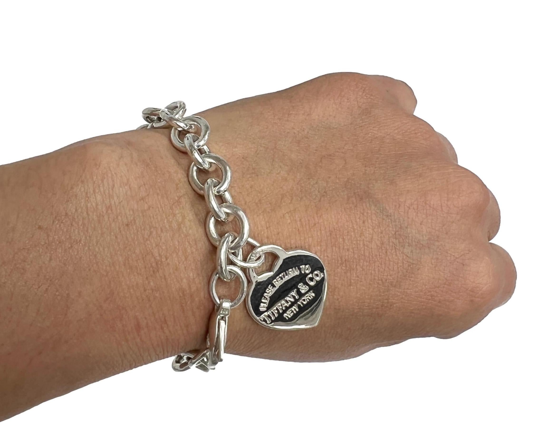 Tiffany & Co. Sterling Silver Return to Tiffany Heart Tag Charm Link Bracelet In Excellent Condition In New York, NY
