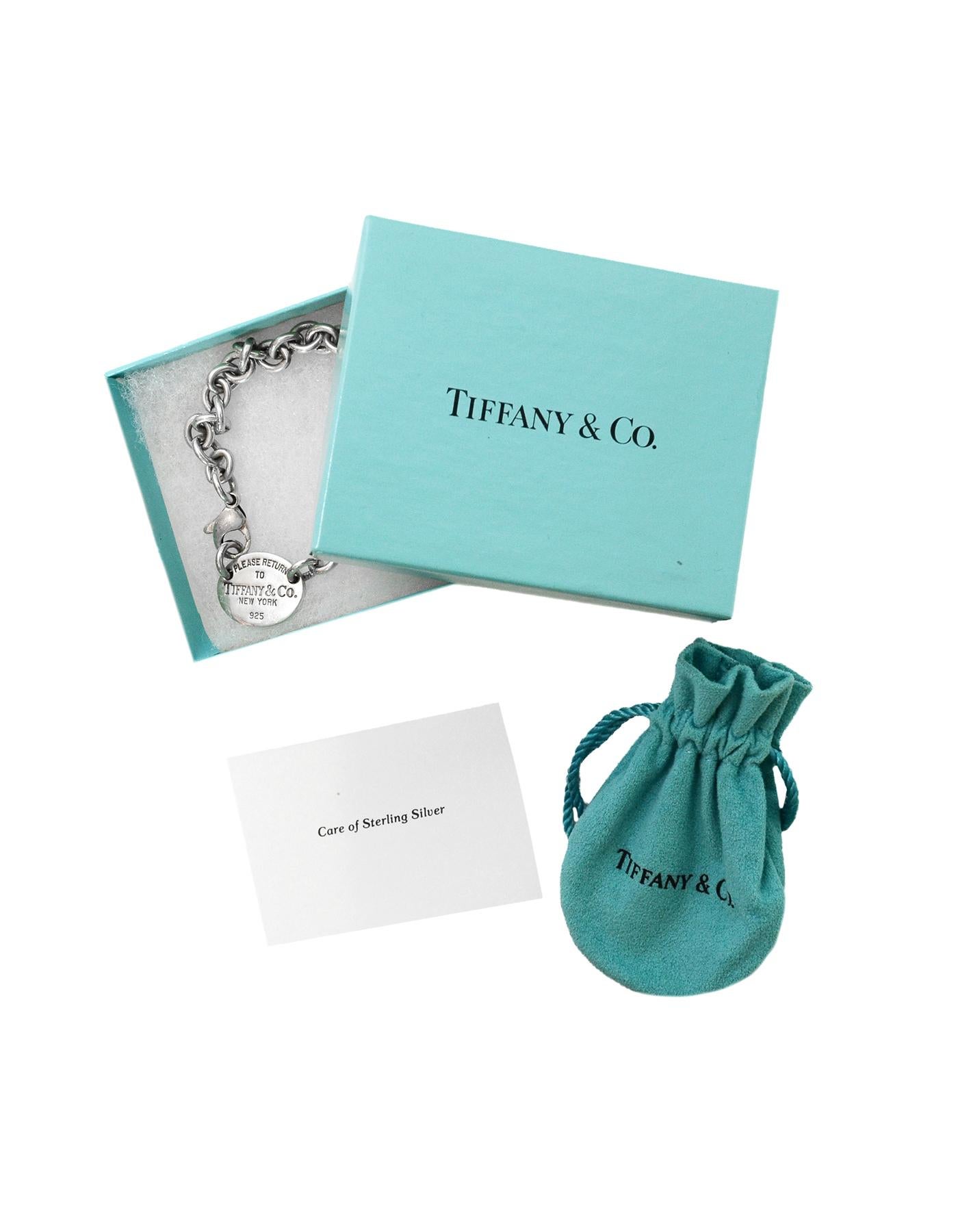 Tiffany & Co Sterling Silver Return To Tiffany Oval Tag Necklace in Box/DB

Color: Silver
Materials:  925 sterling silver
Hallmarks:  On lobster clasp- 