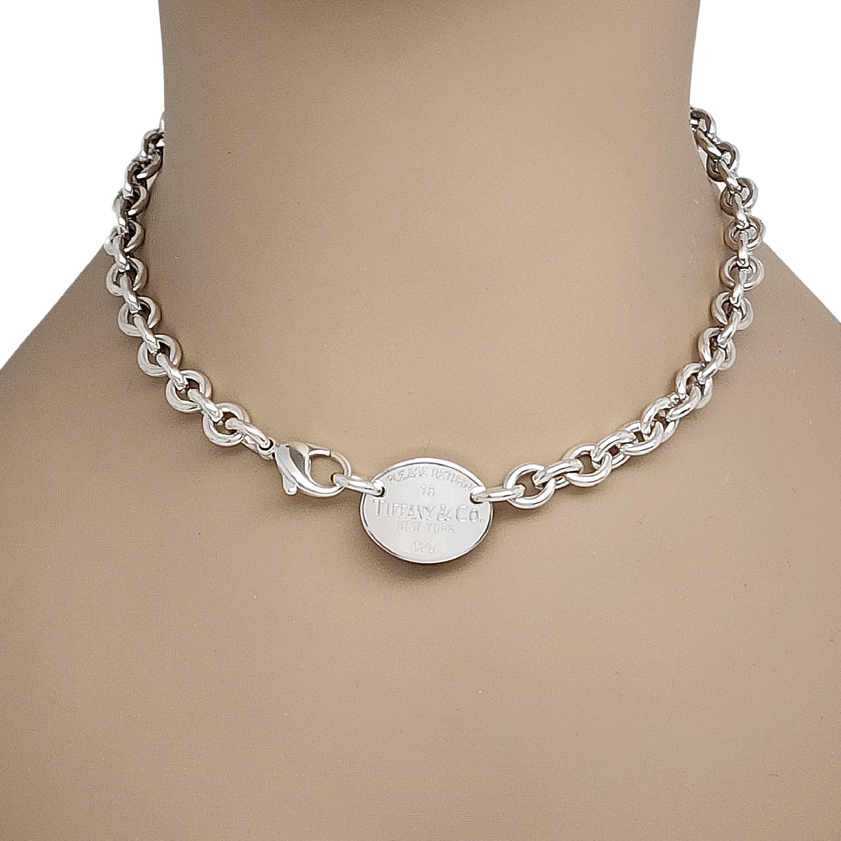 Tiffany & Co sterling silver rolo link choker necklace with Return to Tiffany tag.

Authentic Tiffany necklace featuring rolo links with oval Return to Tiffany tag. Lobster claw closure. Does not include Tiffany & Co box or pouch.

Measures approx