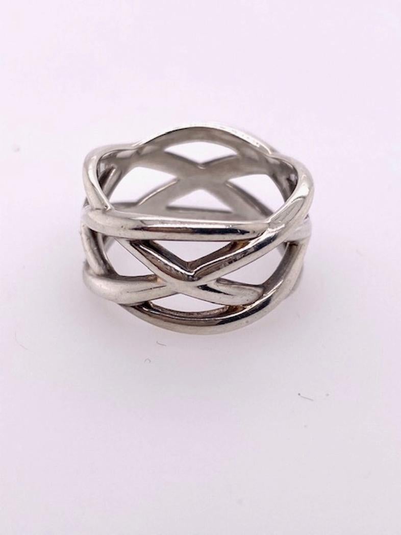 Wide open lattice-work ring.  Made and signed by TIFFANY & CO.  Sterling silver.  Size 7 1/2.