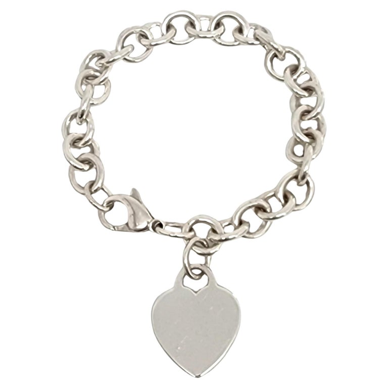 Tiffany and Co. Sterling Silver Rolo Link Bracelet Blank Heart Tag For Sale  at 1stDibs | tag chain bracelet tiffany, tiffany & co bracelet heart, tiffany  silver bracelet with heart