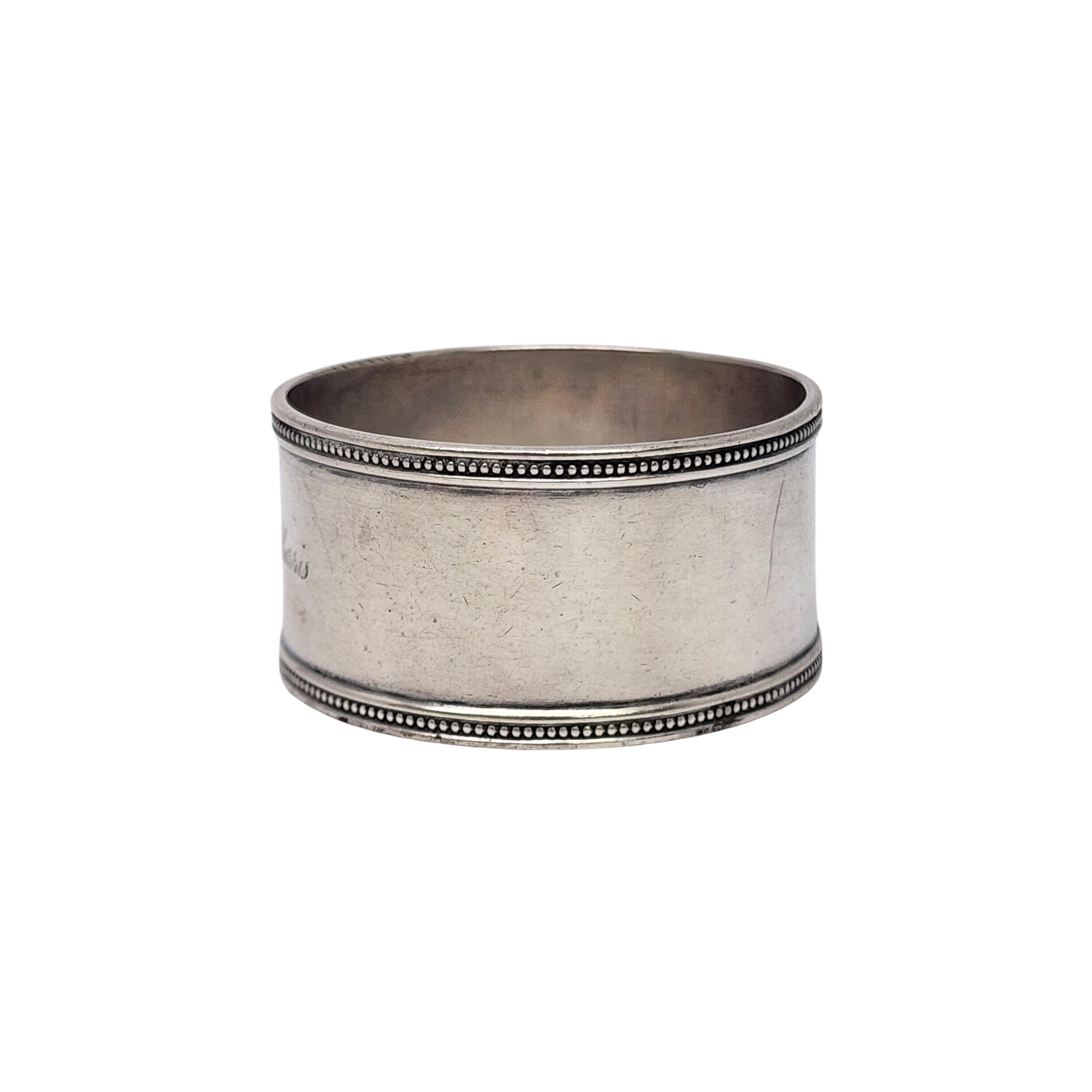 Sterling silver napkin ring by Tiffany & Co with engraving.

Engraving appears to be Fannie Haynes Harris(see photos)

A round napkin ring featuring a smooth polished finish with beaded edges. Engraved on one side. Does not include Tiffany & Co box