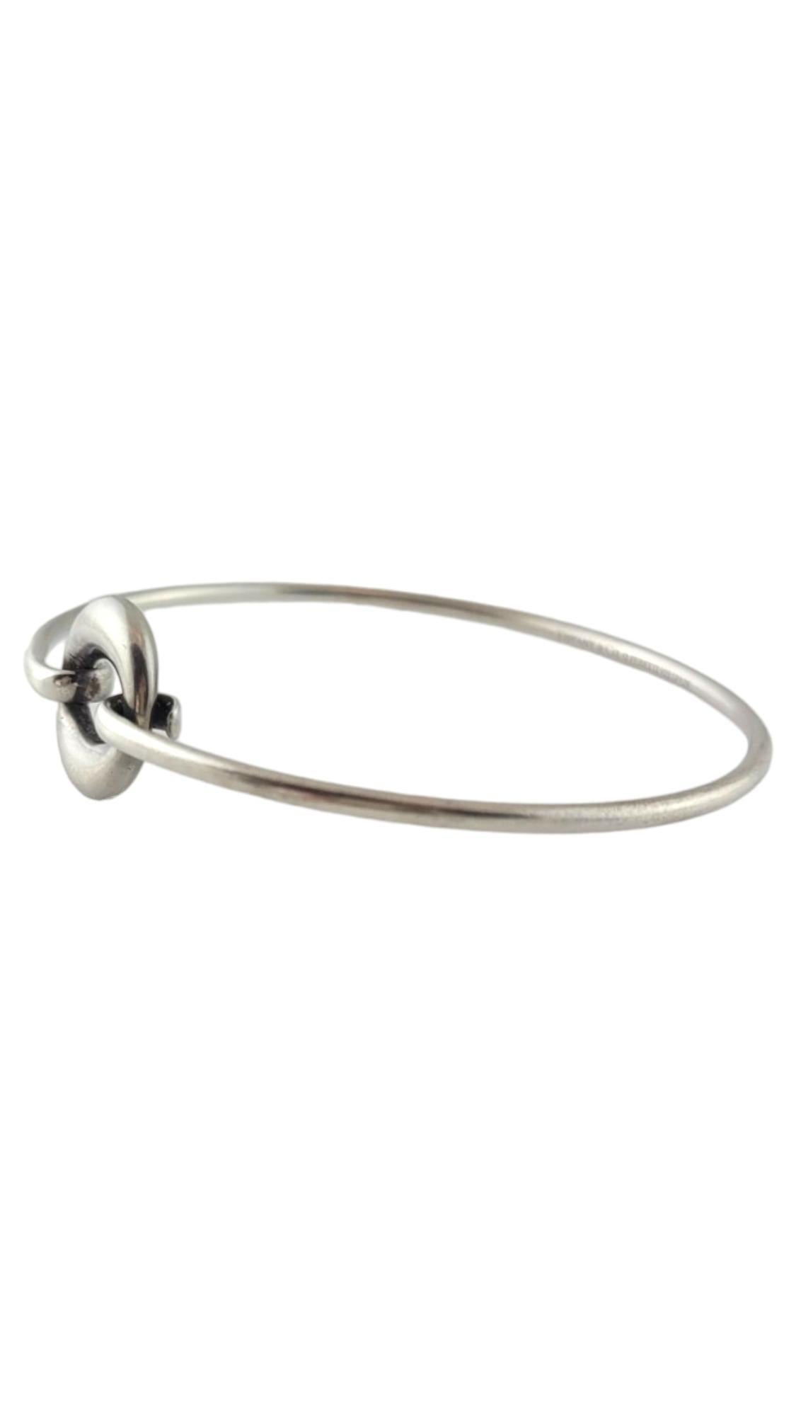 Vintage Tiffany & Co. Sterling Silver Sevillana Peretti Bangle Bracelet

This gorgeous bangle bracelet by designer Tiffany & Co. is crafted from sterling silver for a beautiful finish!

Size: 5.75