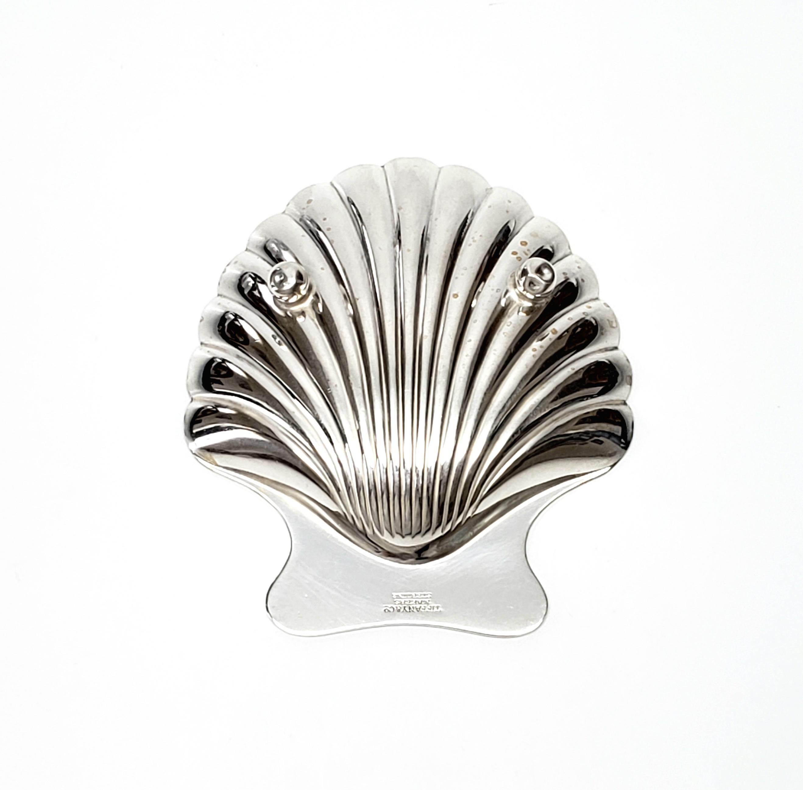 Vintage sterling silver Tiffany & Co. shell bowl.

This beautiful bowl can be used for nuts, candy or even small pieces of jewelry.

Measures approximate 2 7/8