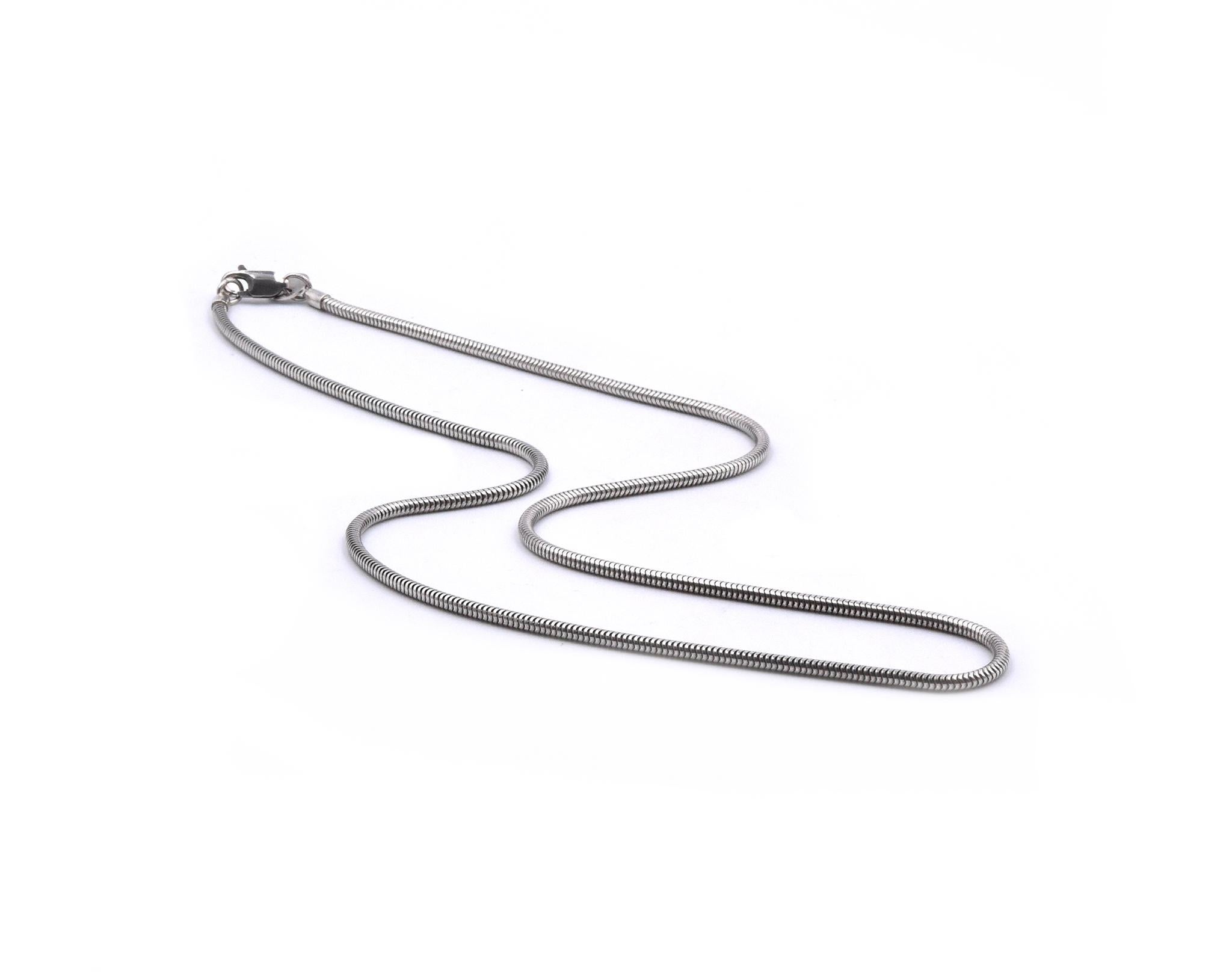 Designer: Tiffany & Co. 
Material: sterling silver
Dimensions: necklace measures 18-inches long
Weight: 10.62 grams
