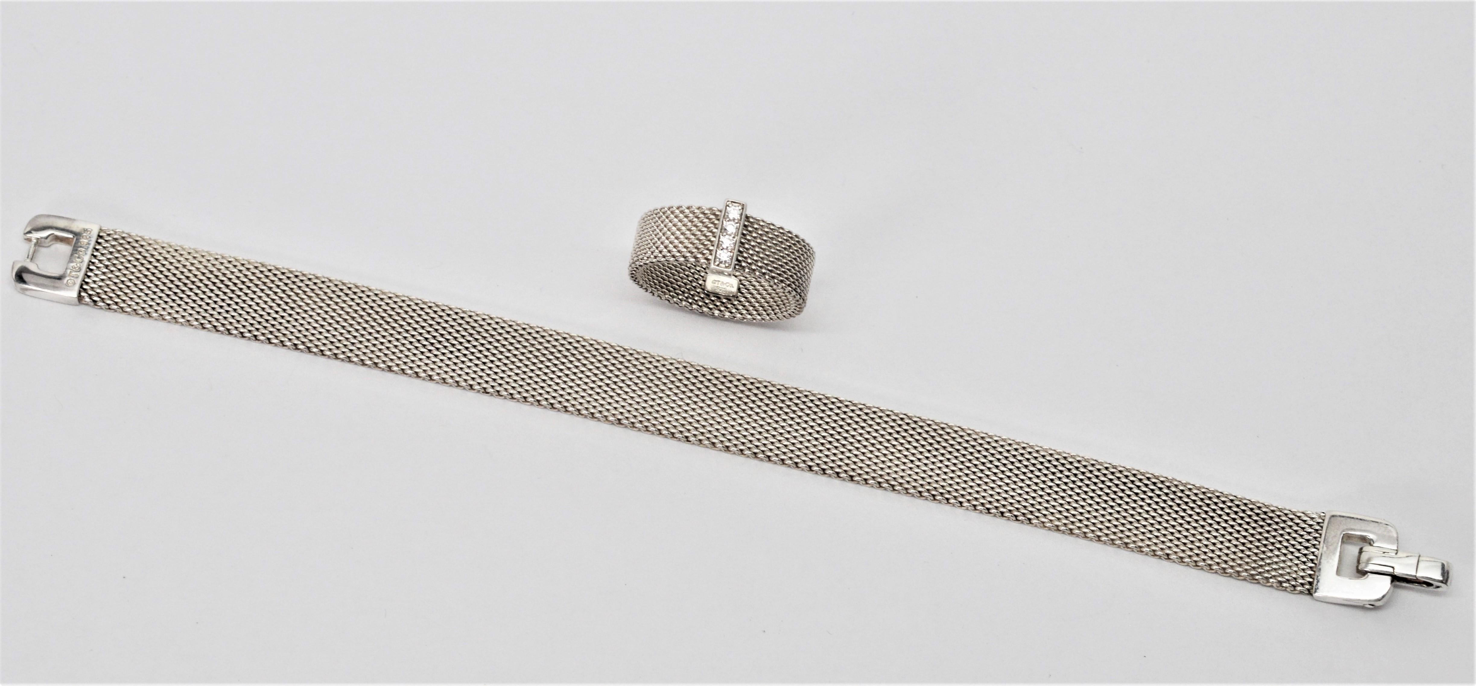 Smart and timeless this hard to find as a set Tiffany & Co. Sterling Silver Somerset Mesh Buckle Bracelet is paired with a matching sterling silver diamond Tiffany & Co. ring. The sterling silver bracelet measures seven inches in length and and 3/8