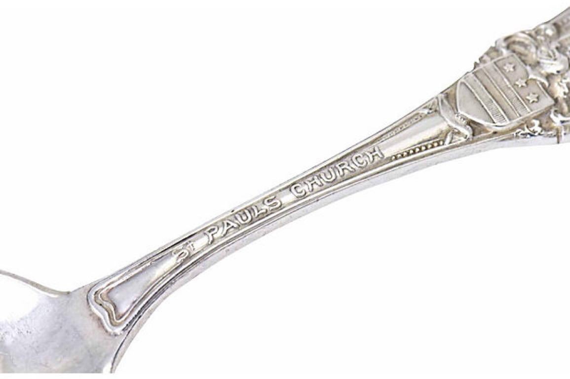 An early 20th century Tiffany & Co. souvenir spoon for St. Paul's Church. There is a finely detailed depiction of Manhattan's St Paul's Church on handled and the back has additional crest detail. This piece is monogramed on the back with a B