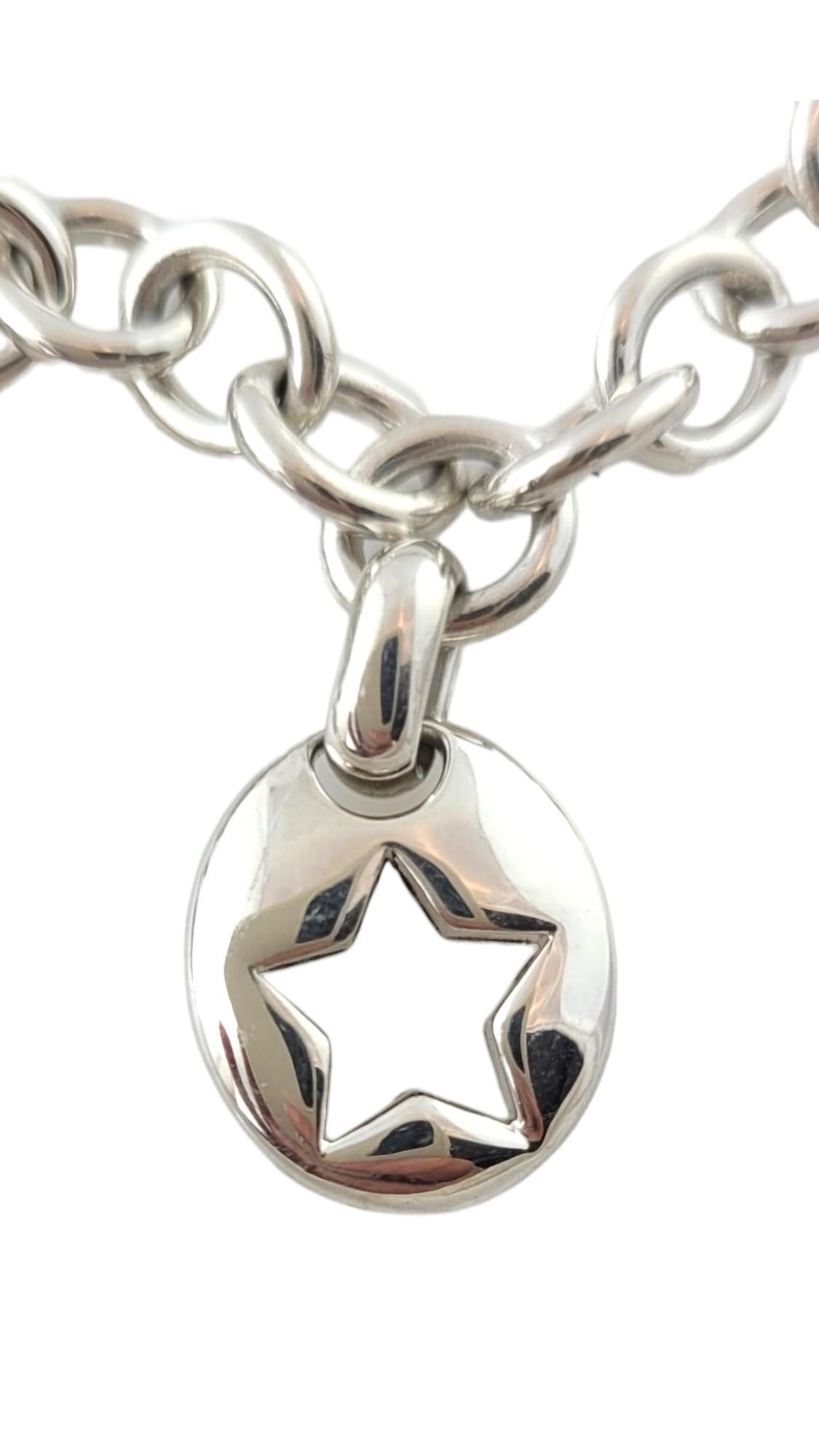 Women's Tiffany & Co. Sterling Silver Stars and Moon Charm Bracelet #17395 For Sale