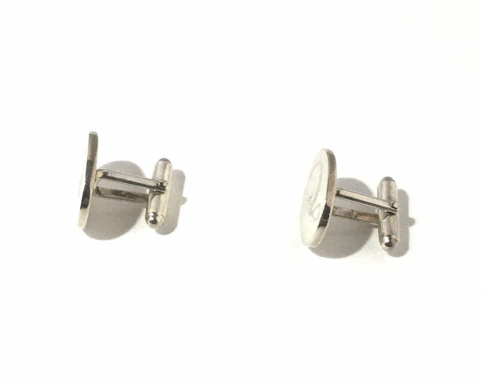 Tiffany & Co Sterling Silver Stethoscope Cufflinks

This is a charming pair of sterling silver stethoscope cufflinks designed by Tiffany & Co.  The perfect gift for a nurse, doctor or anyone in medical profession!!

Measurements:  Cufflinks in the