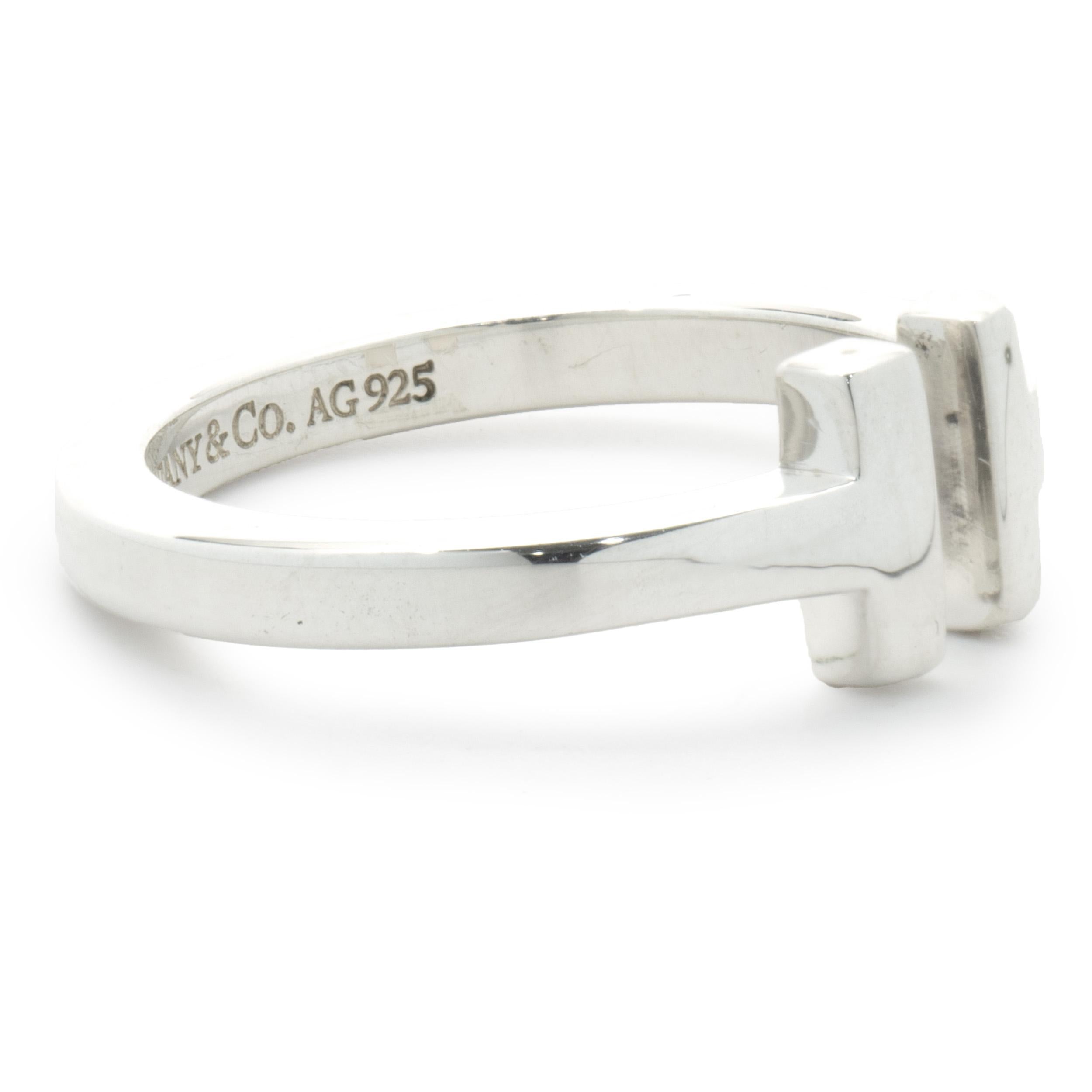 Designer: Tiffany & Co. 
Material: sterling silver
Dimensions: ring top measures 7.7mm
Size: 9
Weight: 4.91 grams