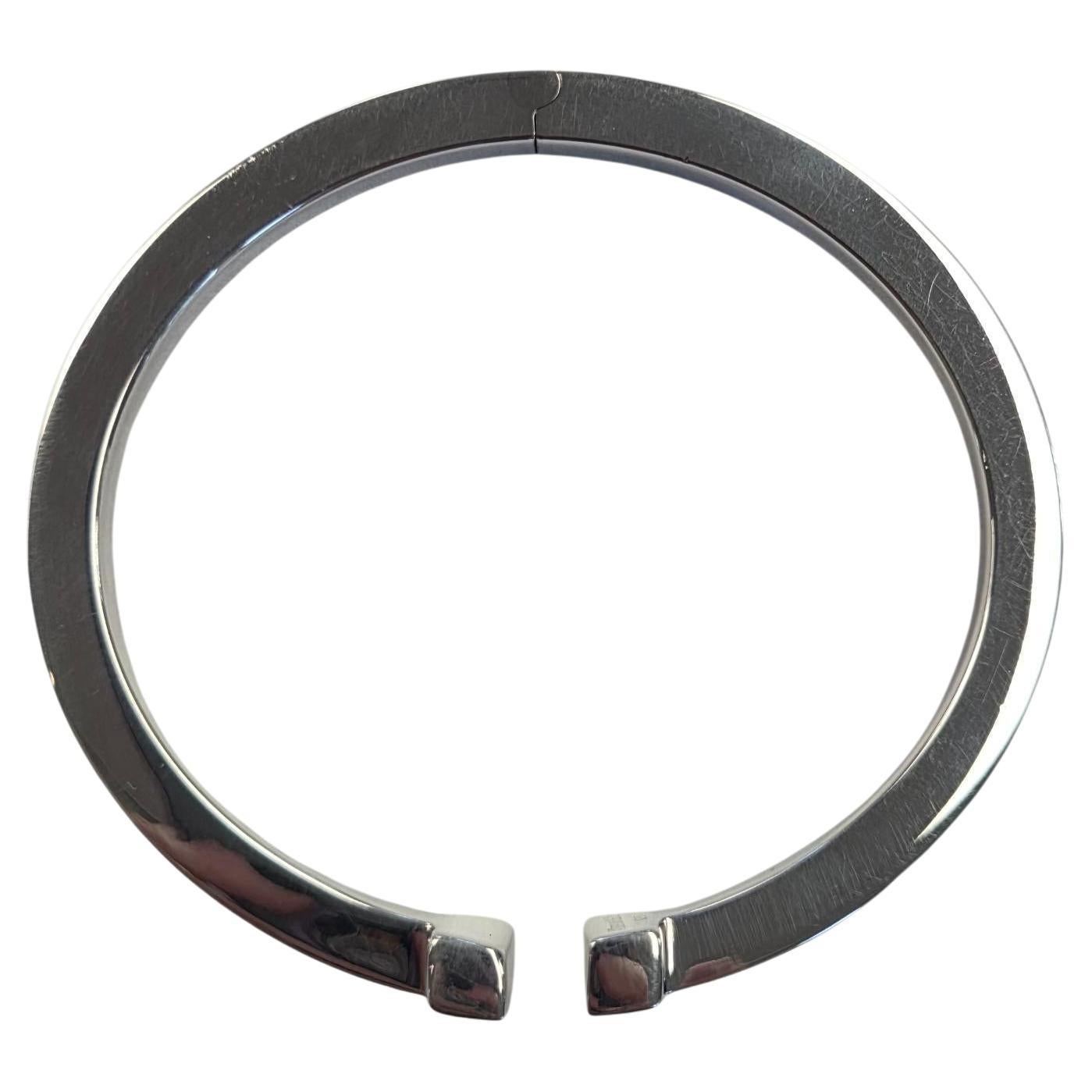 Tiffany 
Co. Sterling Silver T Square Open Bracelet

Very simple and elegant, this T square bracelet by Tiffany crafted in polished sterling silver is the perfect addition to any look.

Hallmark: Tiffany 
Co AG 925

Weight: 29.4g /