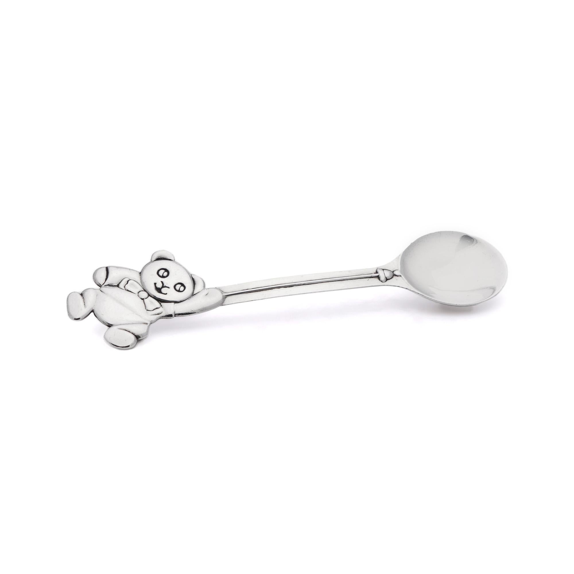 Tiffany & Co. Sterling Silver Teddy Bear Baby Child Feeding Spoon.
Hallmarked with Tiffany & Co. Sterling 925, 1992. 

Dimension:
Length: 13.5 cm
Width: 3 cm 
Height: 0.8 cm 
Weight: 36 grams 

Condition: General usage, minor wear, and tear, good