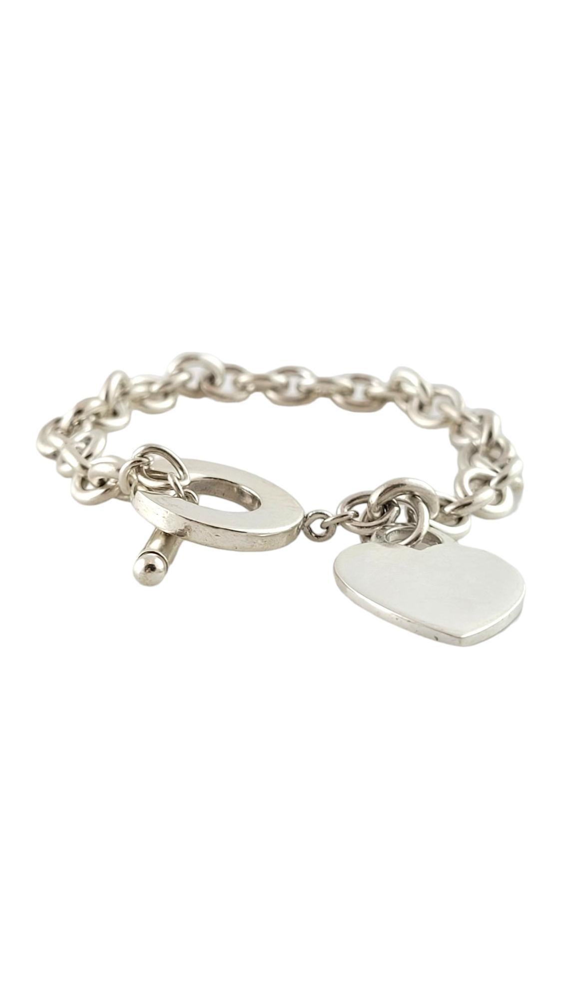 Tiffany & Co. Sterling Silver Toggle Heart Tag Bracelet

This beautiful link toggle bracelet by Tiffany & Co was crafted from sterling silver and features a classic Tiffany heart charm!

Size: 7.5