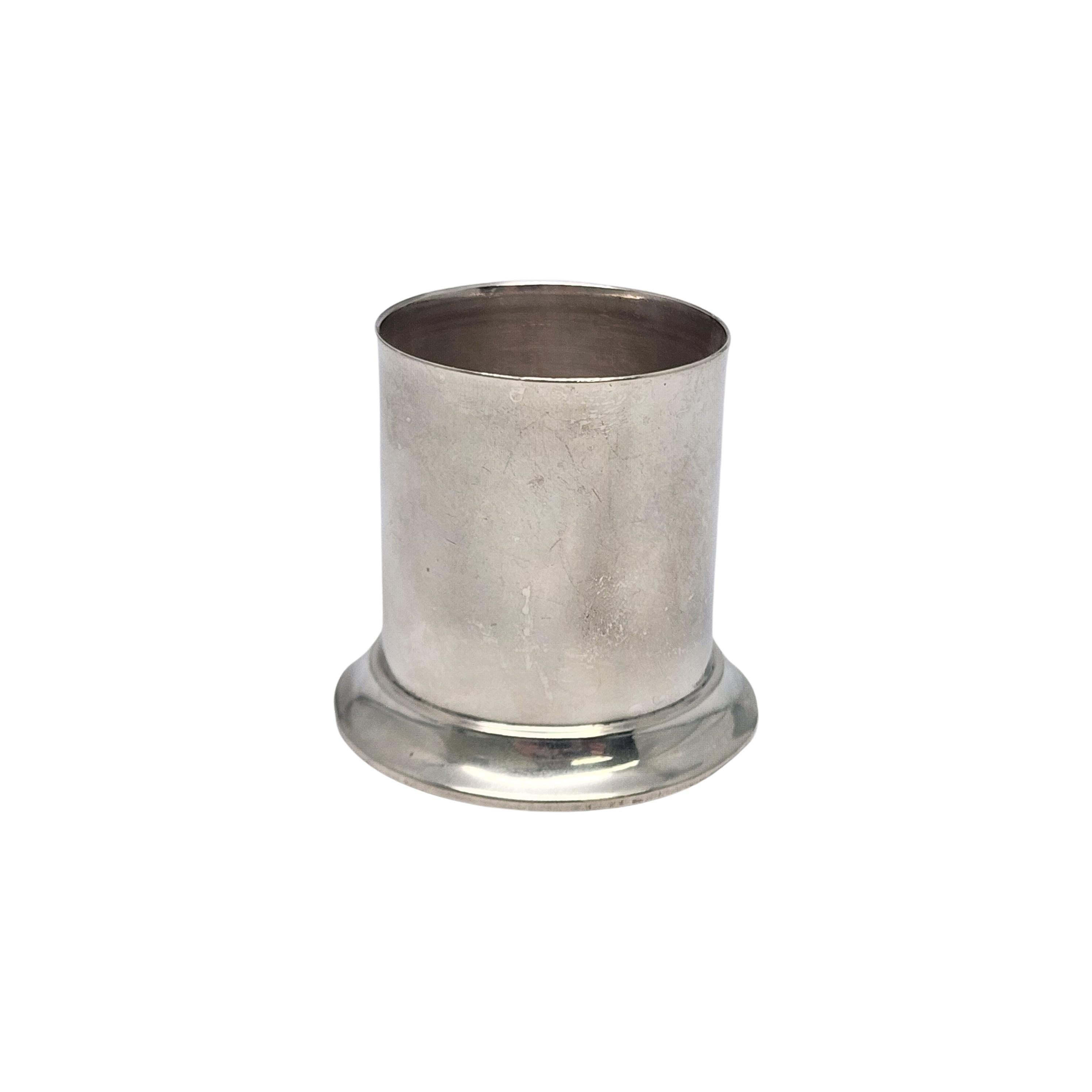Sterling silver toothpick holder by Tiffany & Co.

No monogram.

This simple and timeless design features a smooth polished finish. Pattern number dates this piece to circa 1949.  Hallmarks date this piece to manufacture under the directorship of