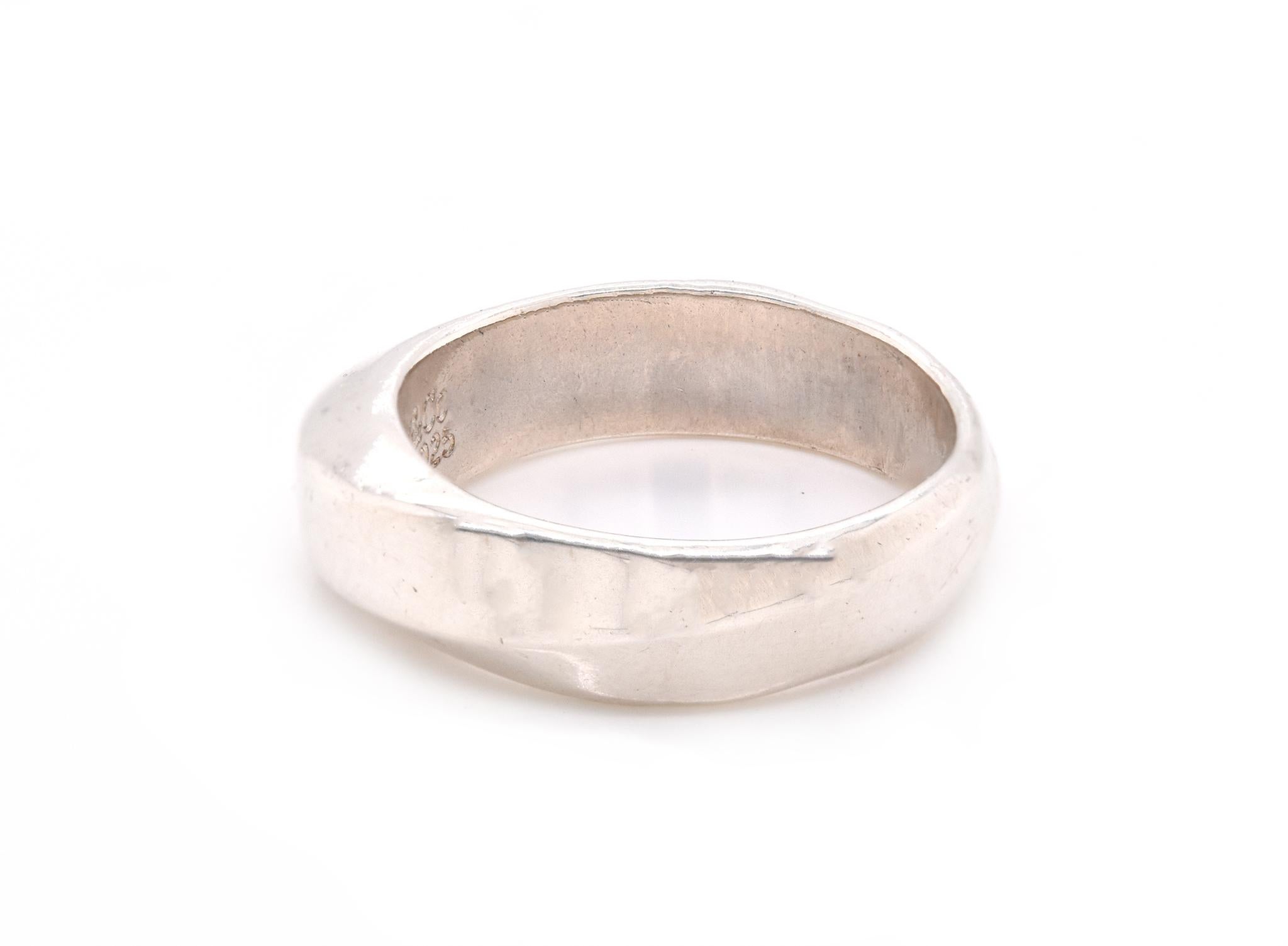 Designer: Tiffany & Co. 
Material: sterling silver
Dimensions: band measures 5.7mm wide
Weight: 4.7 grams
Size: 5.25
