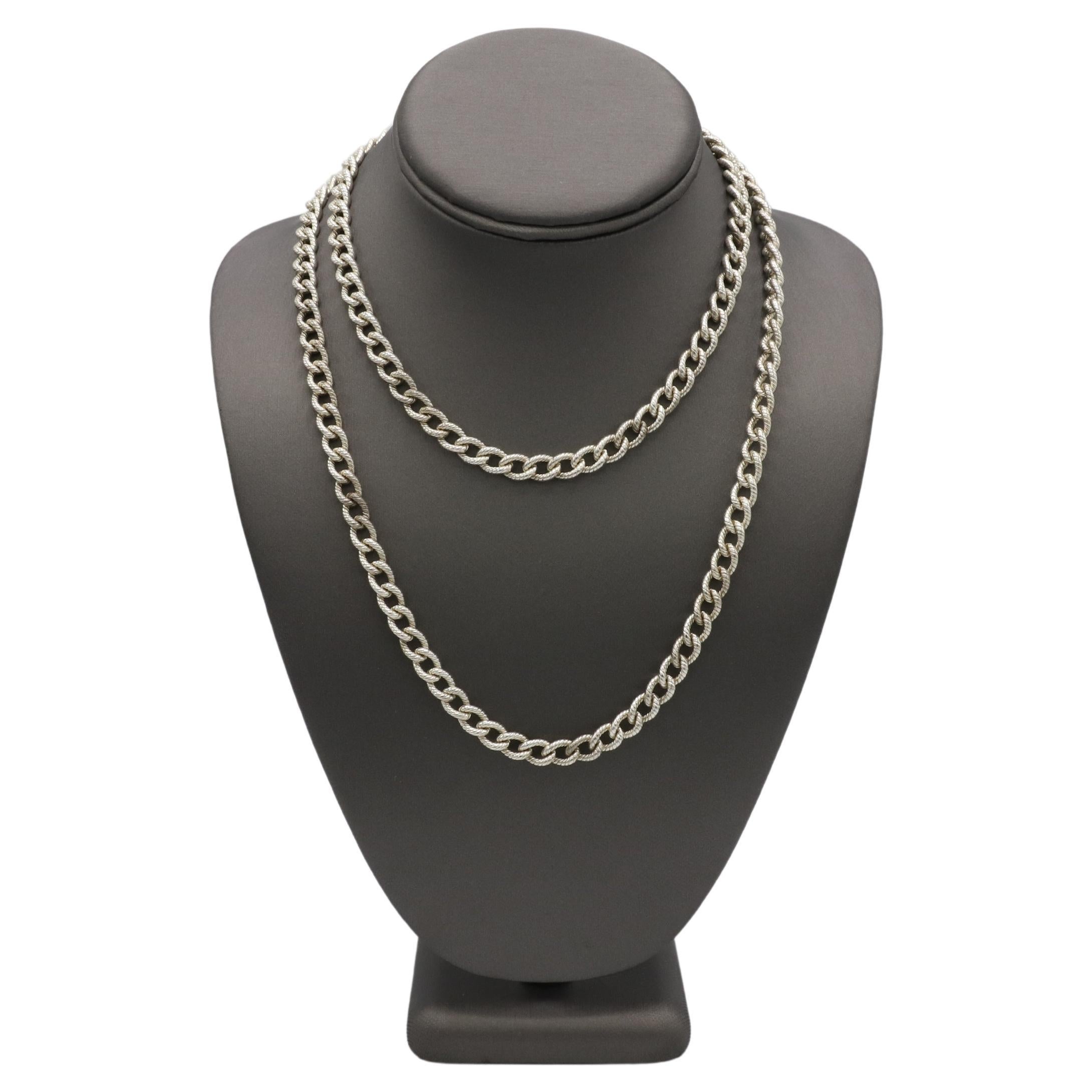 Tiffany & Co. Sterling Silver Twisted Cuban Cable Chain Long Link Necklace 
Metal: Sterling silver 925
Weight: 103 grams
Length: 35 inches
Width: 7mm
Signed: Tiffany & Co. 925
Clasp: Lobster

