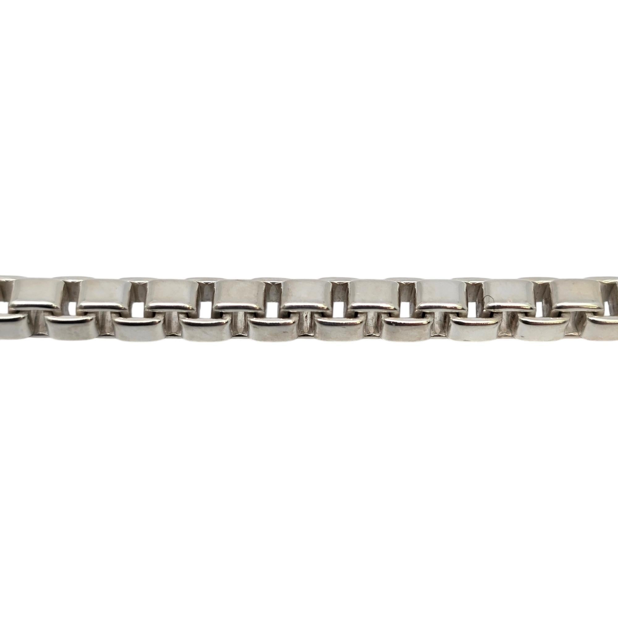 Tiffany & Co sterling silver Venetian box chain bracelet.

Authentic Tiffany bracelet featuring a classic box chain design. Tiffany pouch and box are not included.

Measures approx 7