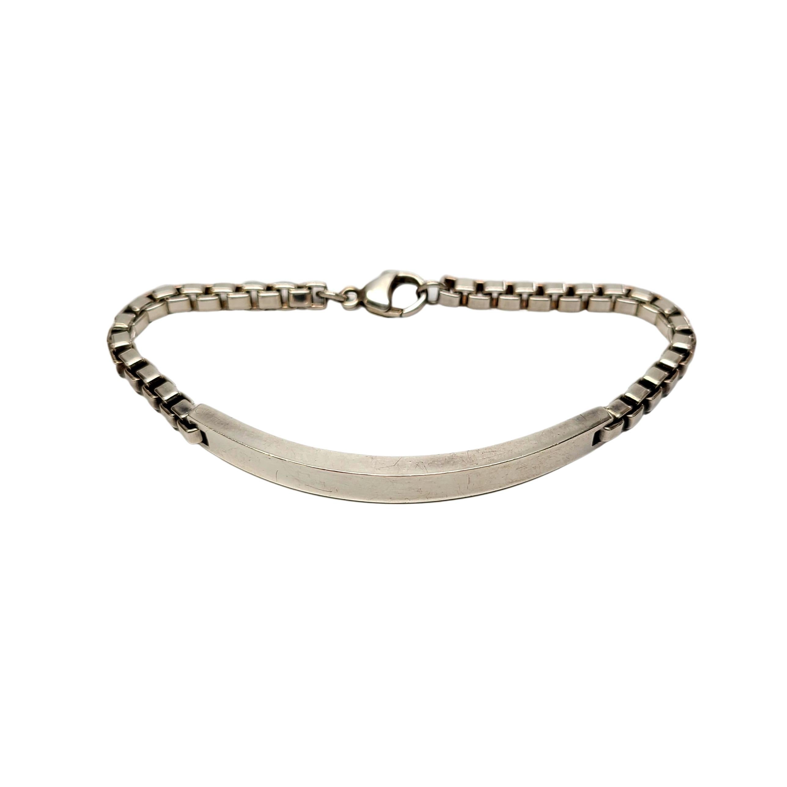 Tiffany & Co sterling silver Venetian link blank ID bracelet.

Authentic Tiffany sterling silver bracelet, features a curved, blank bar on a Venetian box link chain. Tiffany pouch and box not included.

Measures approx 7